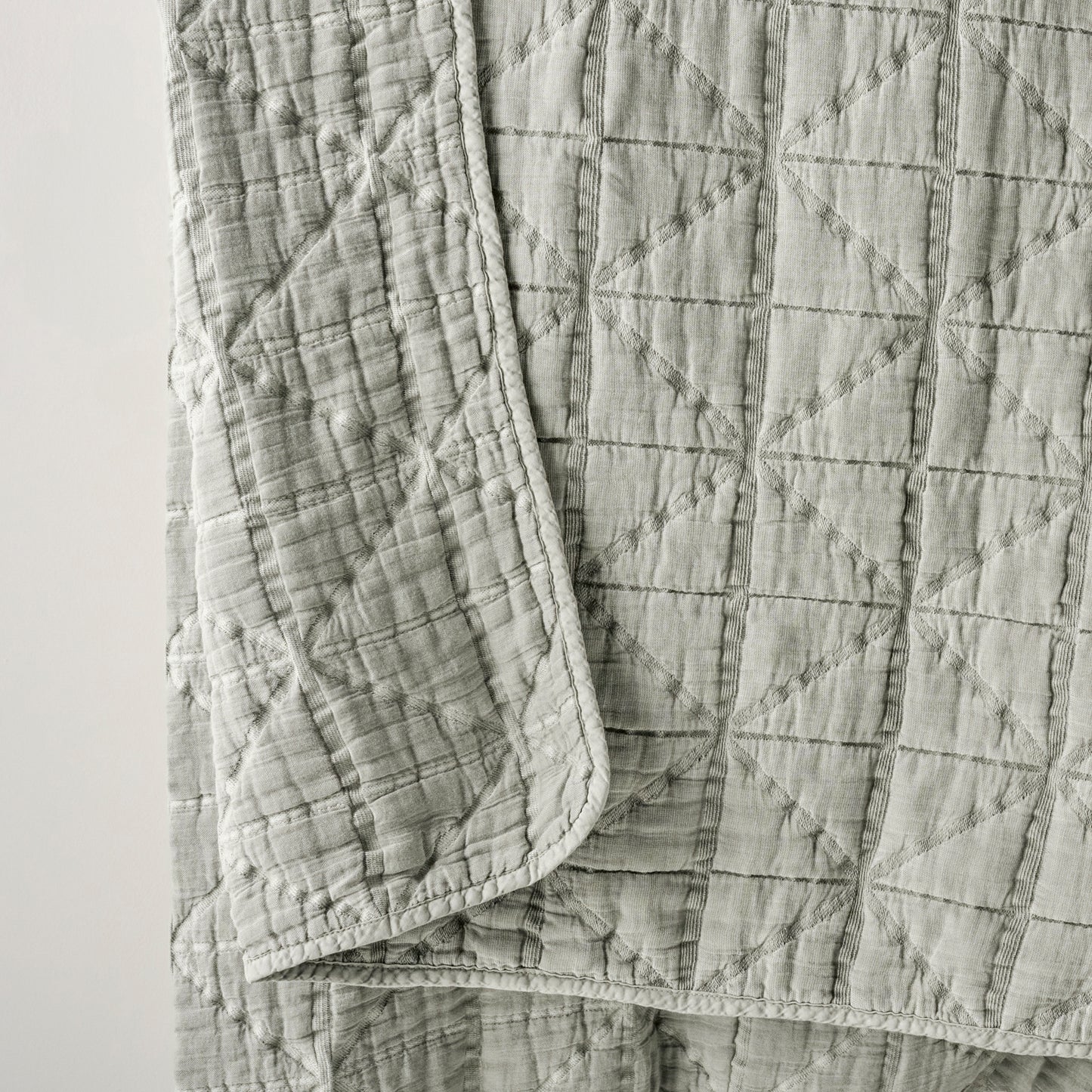 Sutton Stone Blue Matelasse Coverlet up close
