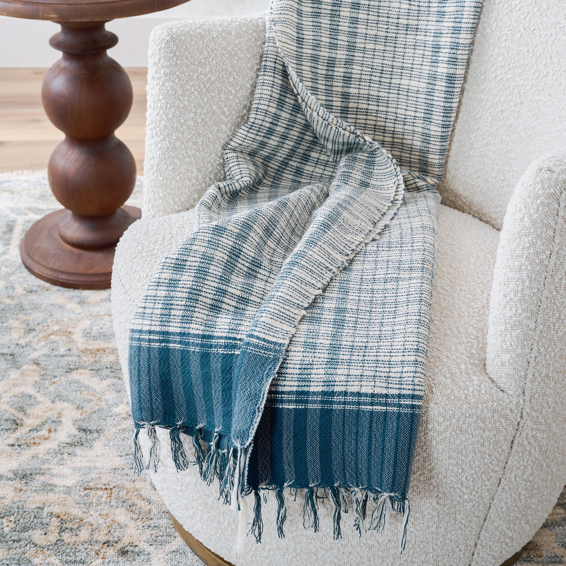 Blue Merrill Plaid Throw shown draped over chair