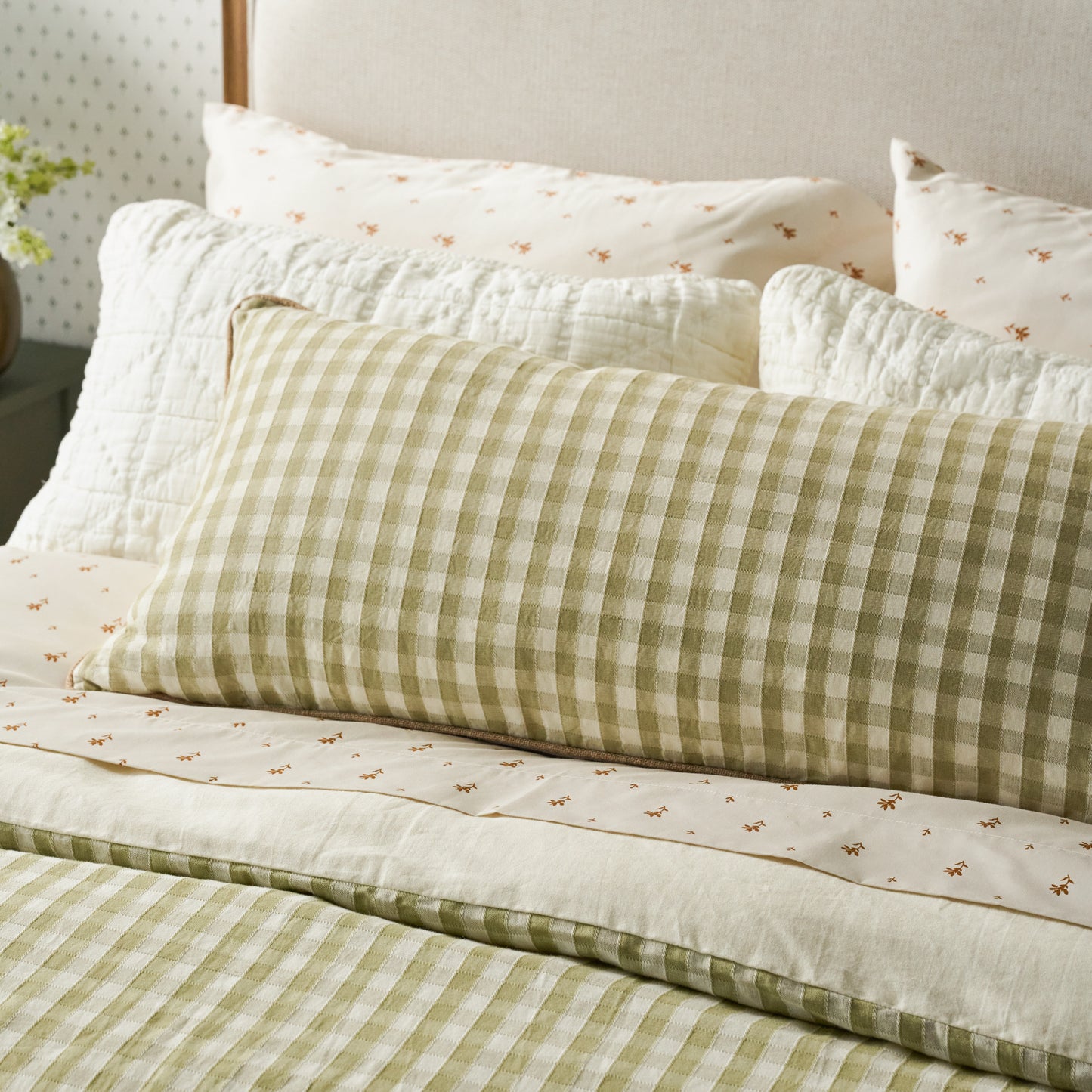 Maxine Gingham Large Lumbar Pillow on bed