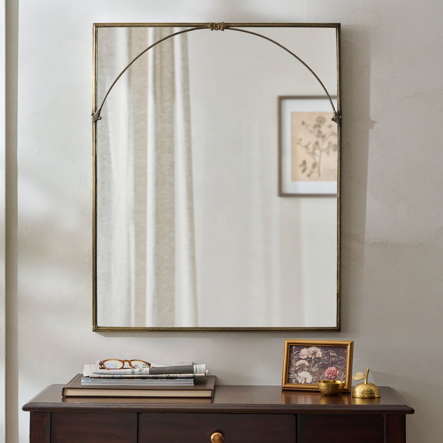 Vienna Metal Framed Mirror shown hung above vanity