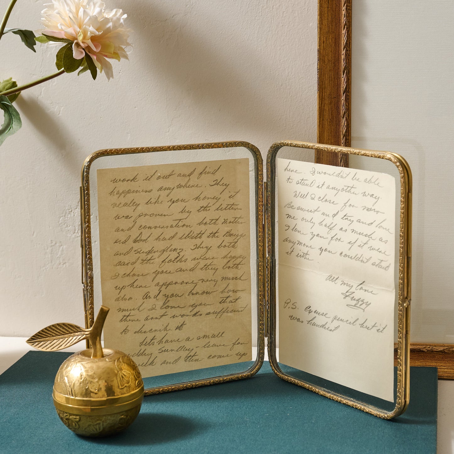 Antiqued Brass Double Photo Frame shown with note inside