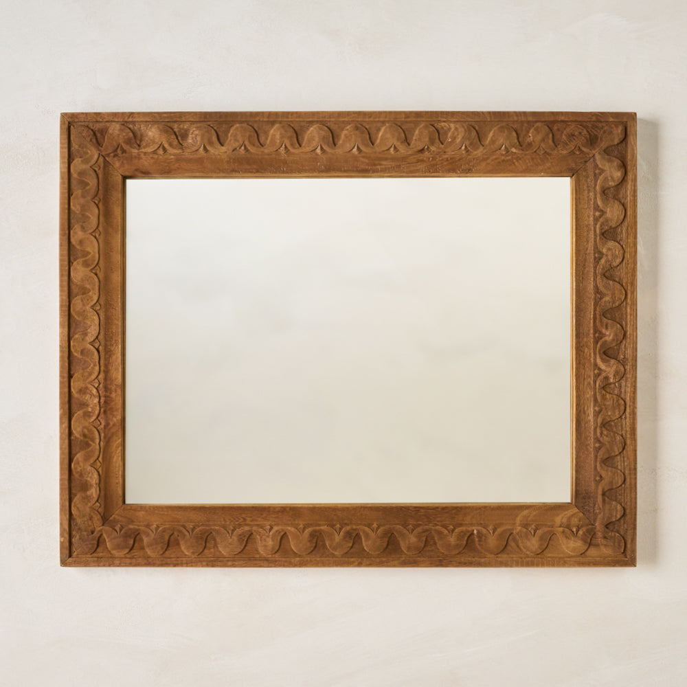 Hand-Carved Antiqued Wood Mirror shown hung horizontally