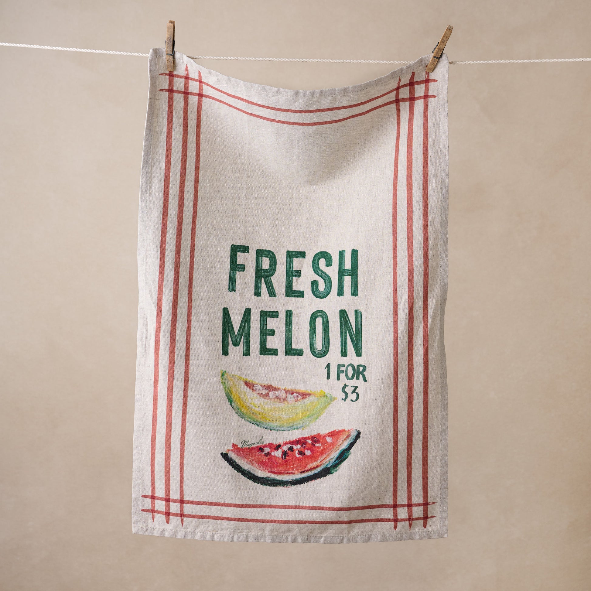 Magnolia Fresh Melon Tea Towel hanging