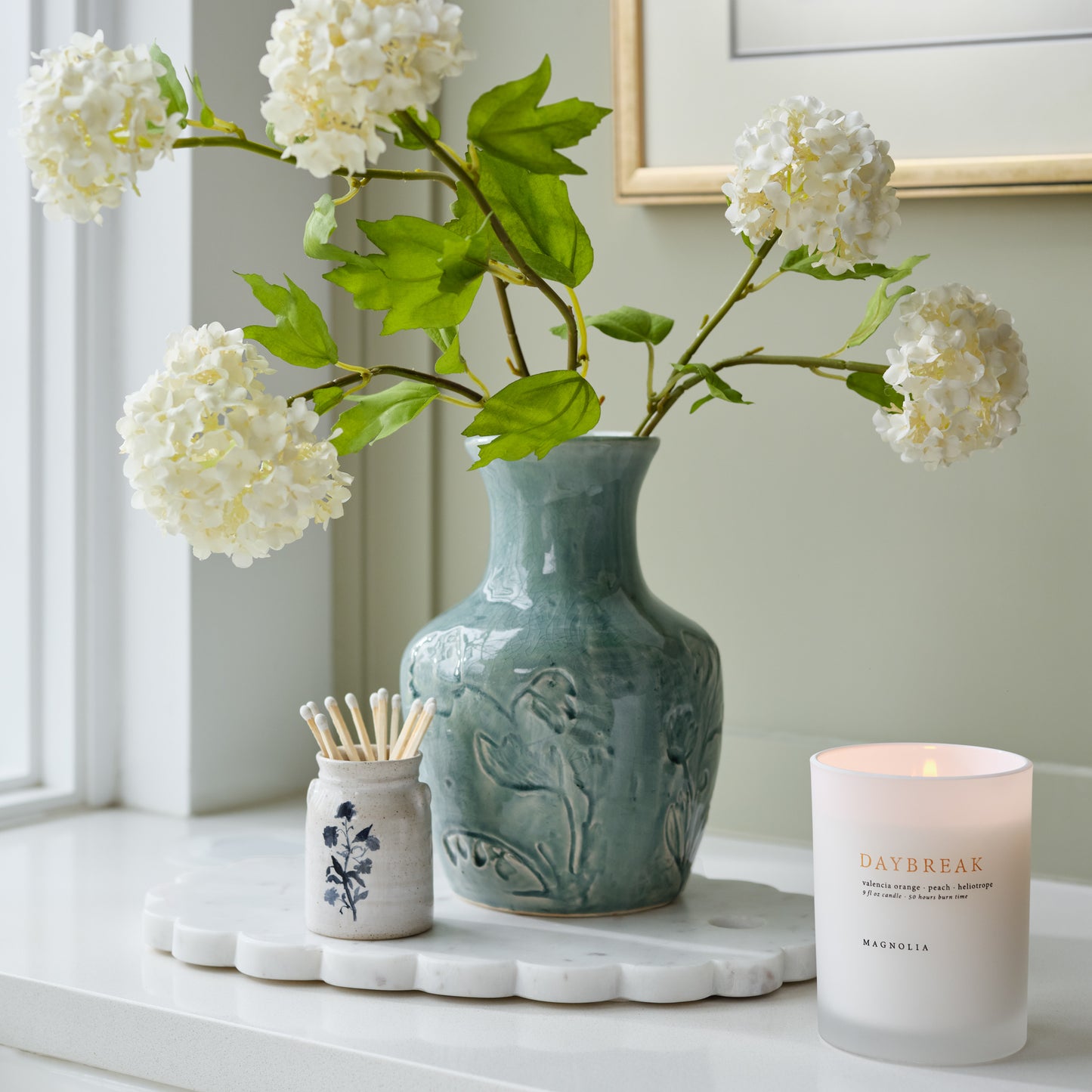Floral Glazed Ceramic Birdie Vase shown with florals, candle, and matches on tray