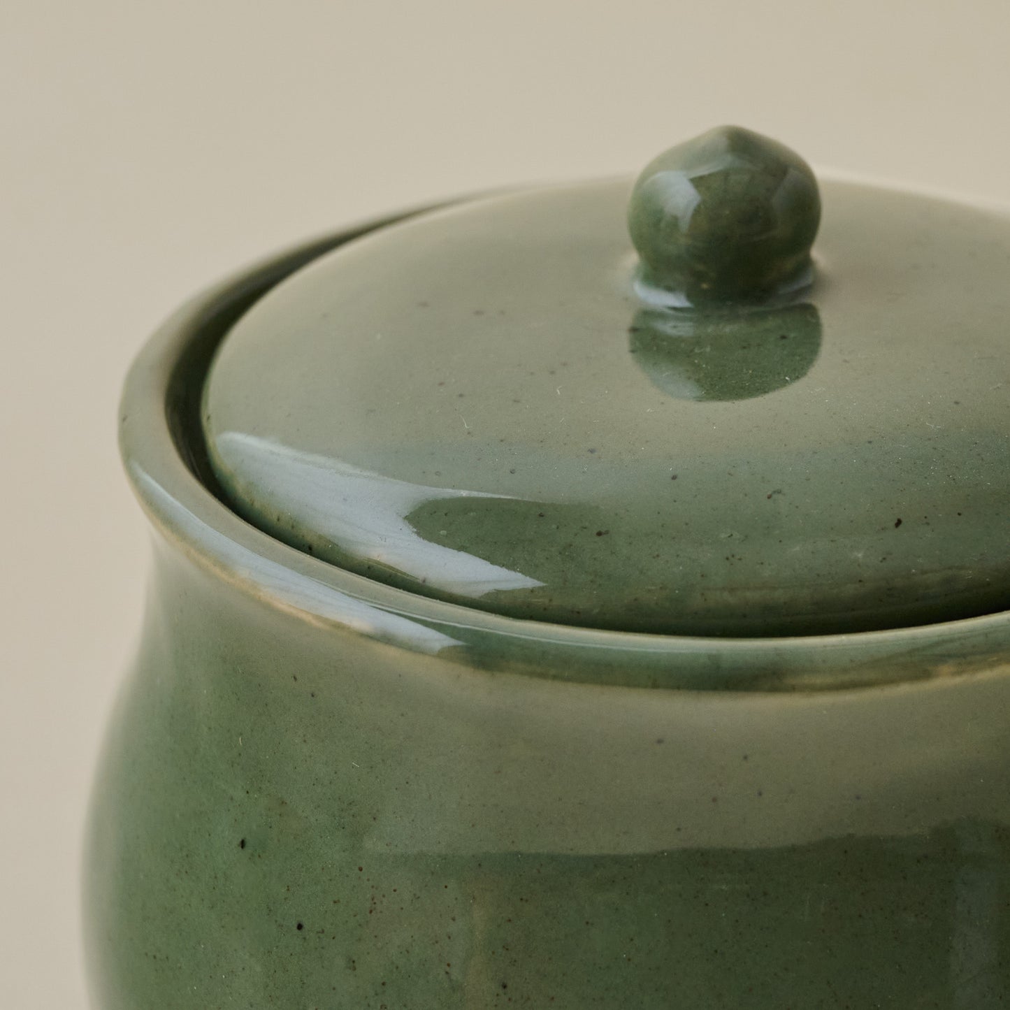 The Cottage Collection Forest Green Speckle Sugar Jar up close