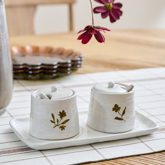 Eliana Floral Ceramic Salt + Pepper Set shown on table