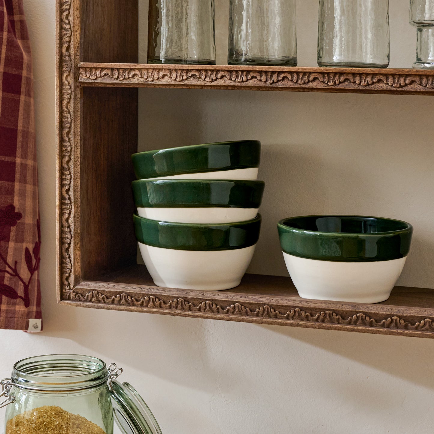 The Cottage Collection Green Rim Cereal Bowls shown on kitchen shelf