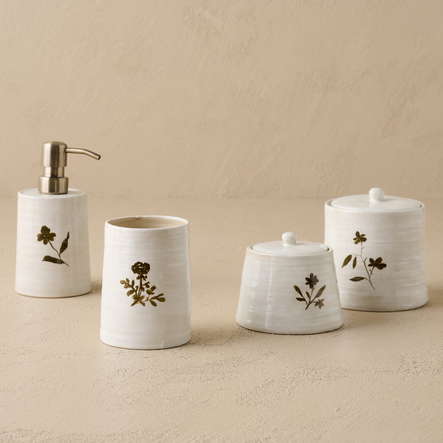Eliana Floral Soap Pump shown with other Eliana bathroom accessories
