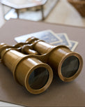 Decorative Solid Brass Binoculars on a coffee table
