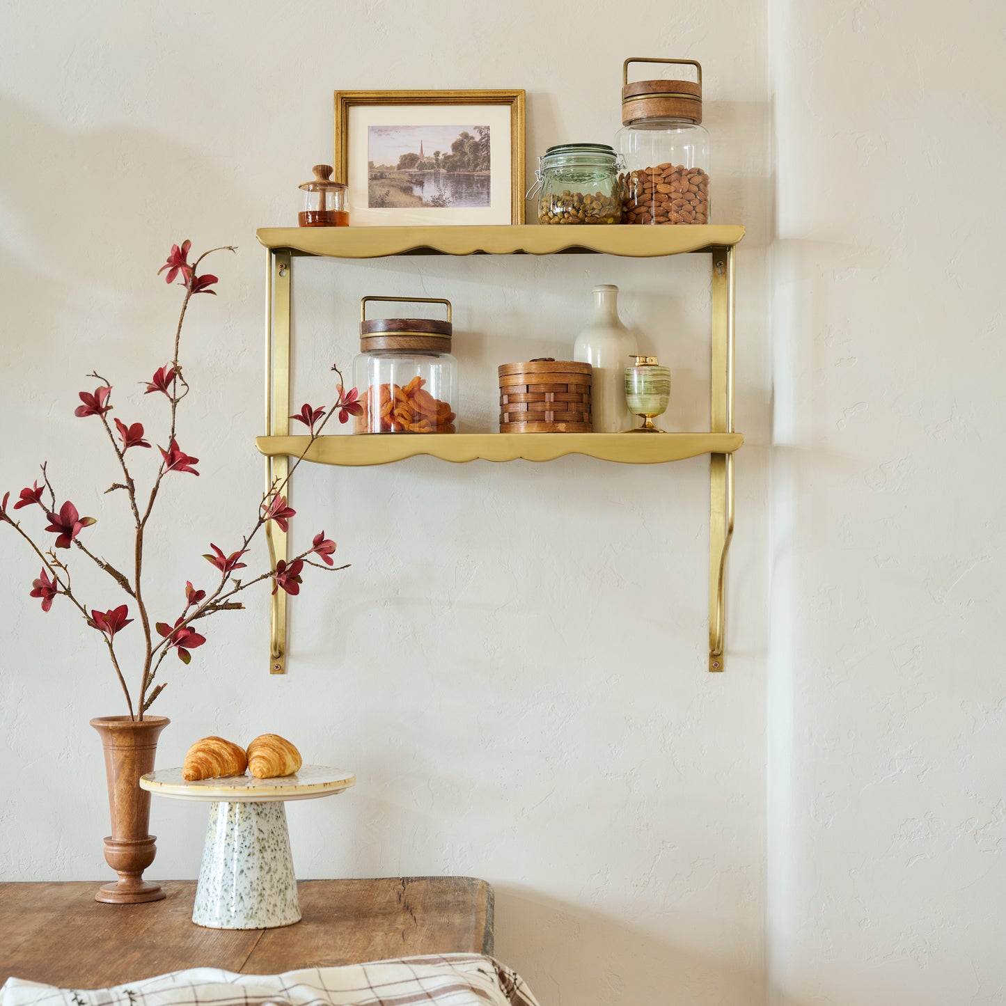 Rosalie Double Brass Scalloped Shelf shown styled on wall