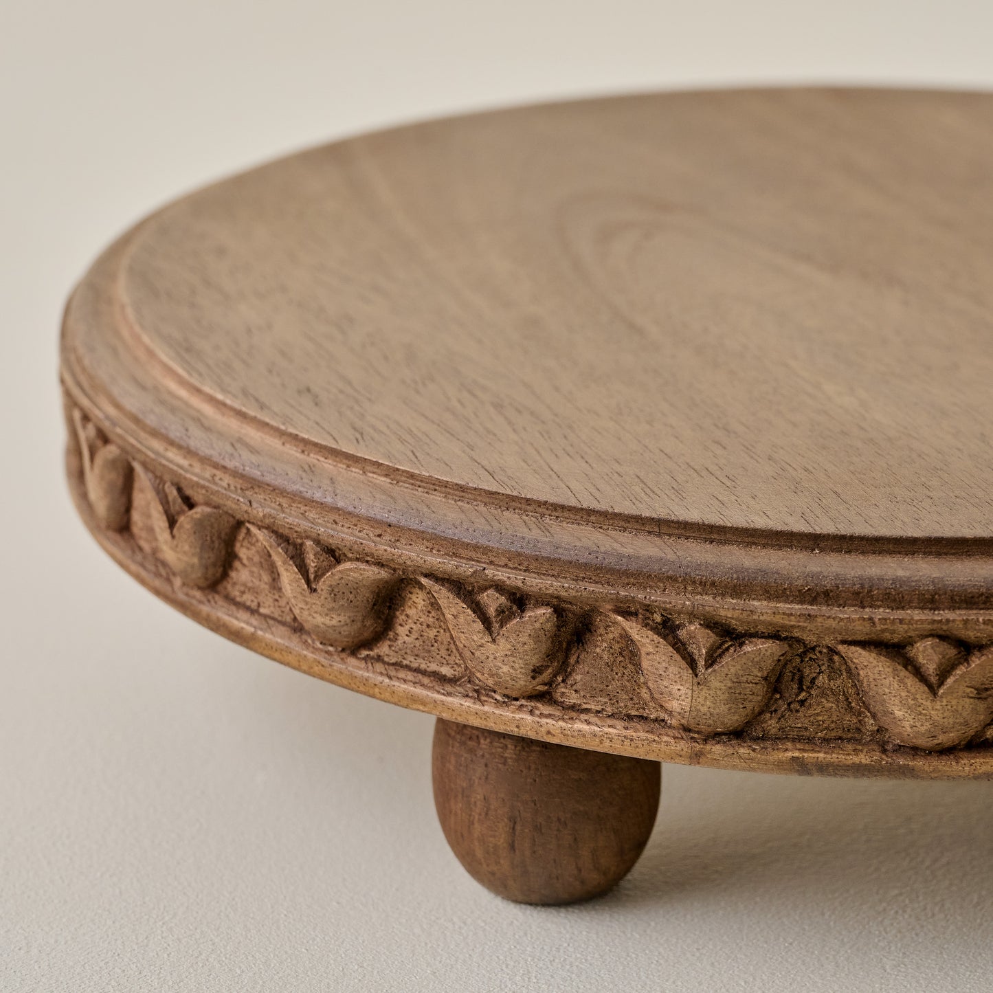 Warren Carved Wood Riser up close
