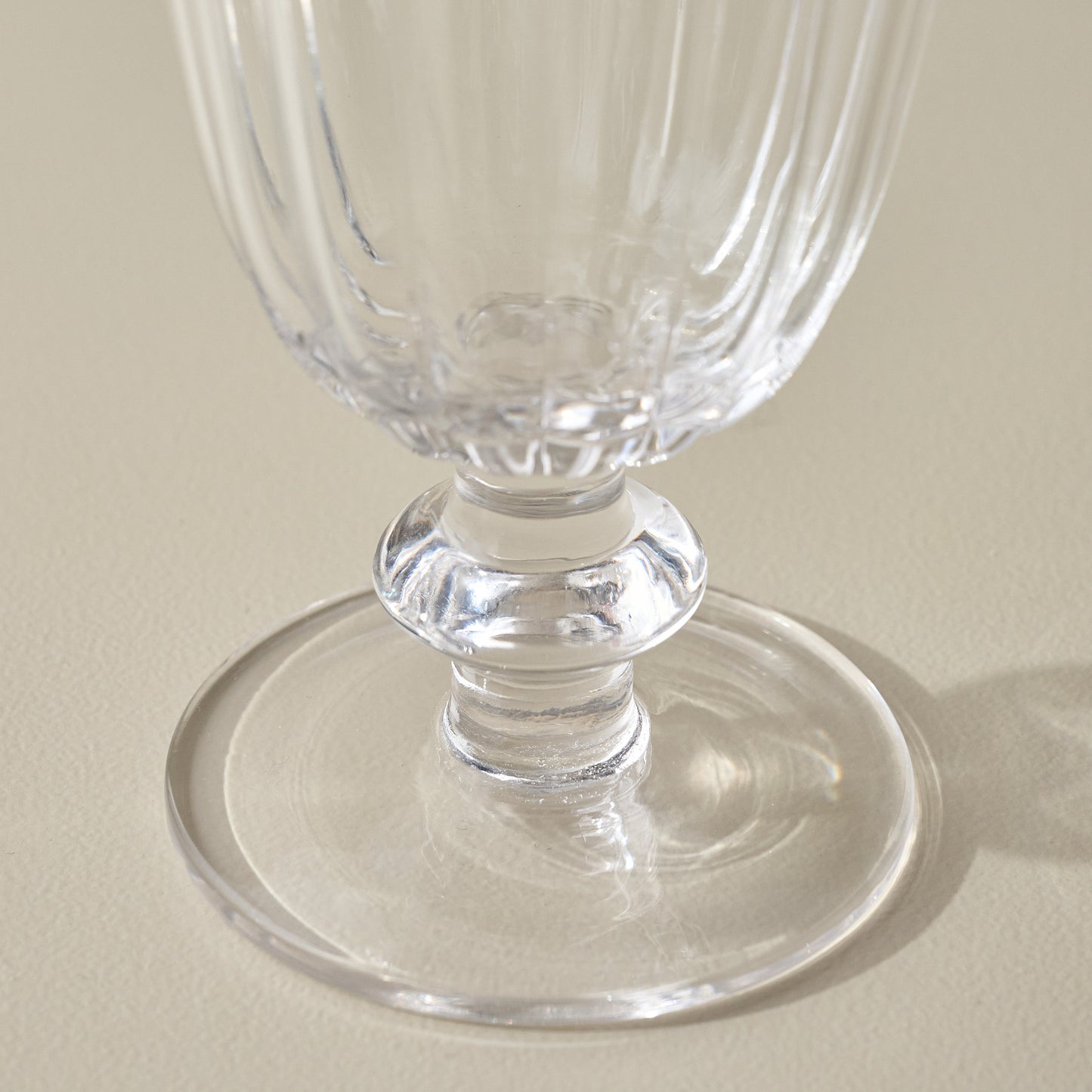 Large Scalloped Rim Glass Tumbler stem base up close
