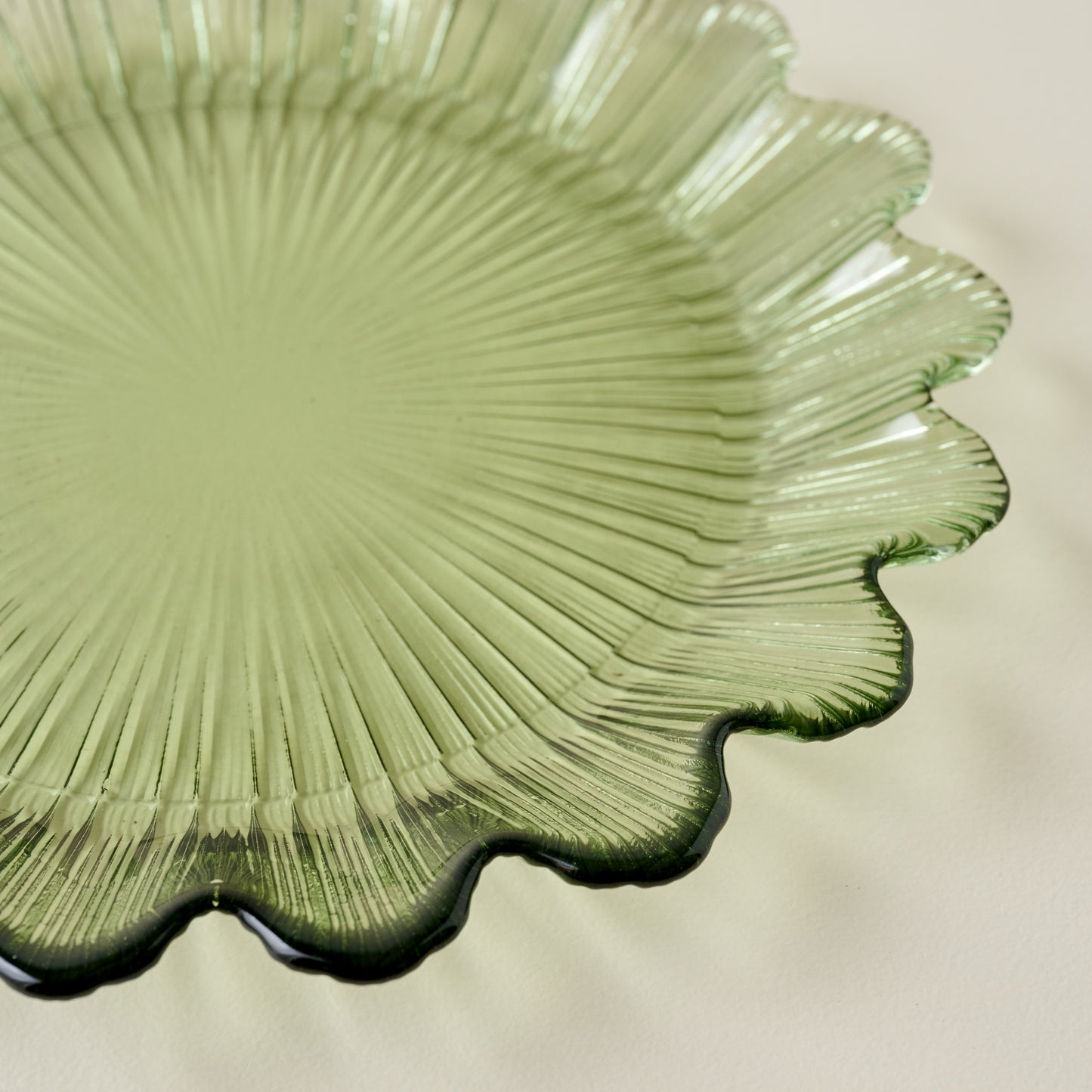 Emmeline Green Scalloped Glass Plate up close