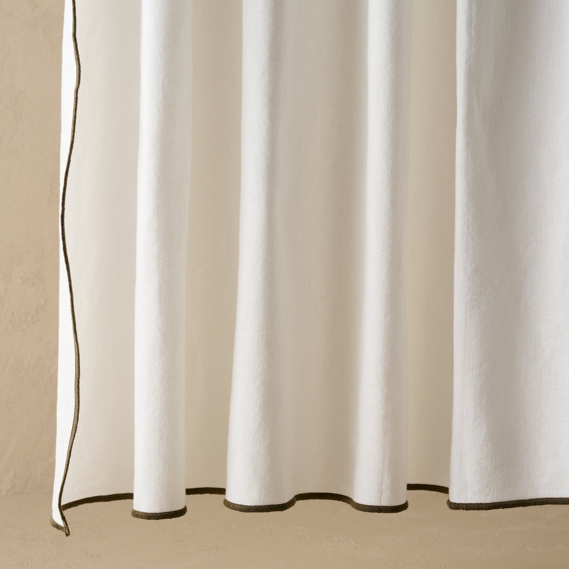 Magnolia Olive Edge Ruffle Shower Curtain bottom corner up close