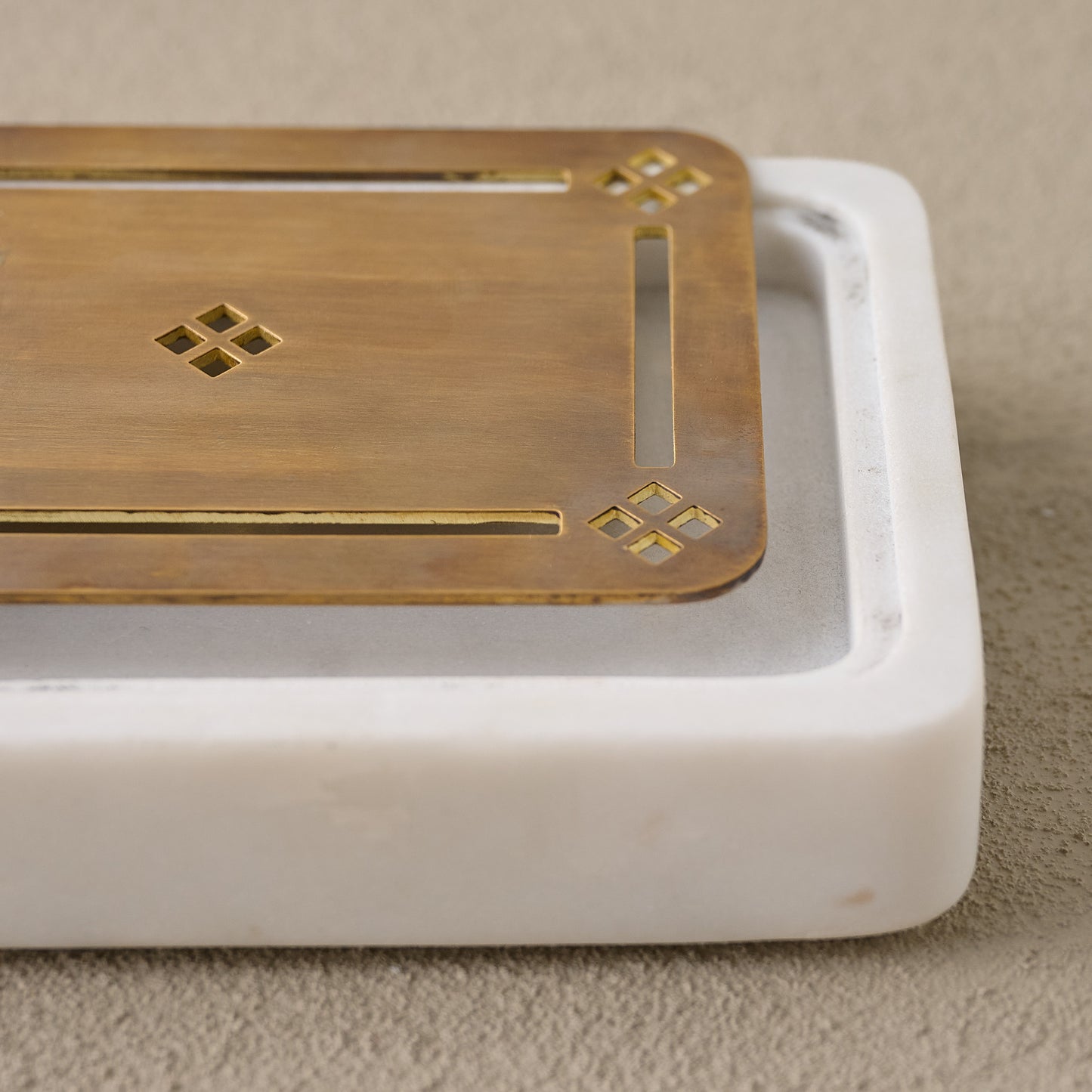 Quincey Marble and Brass Inlay Soap Dish in white corner up close