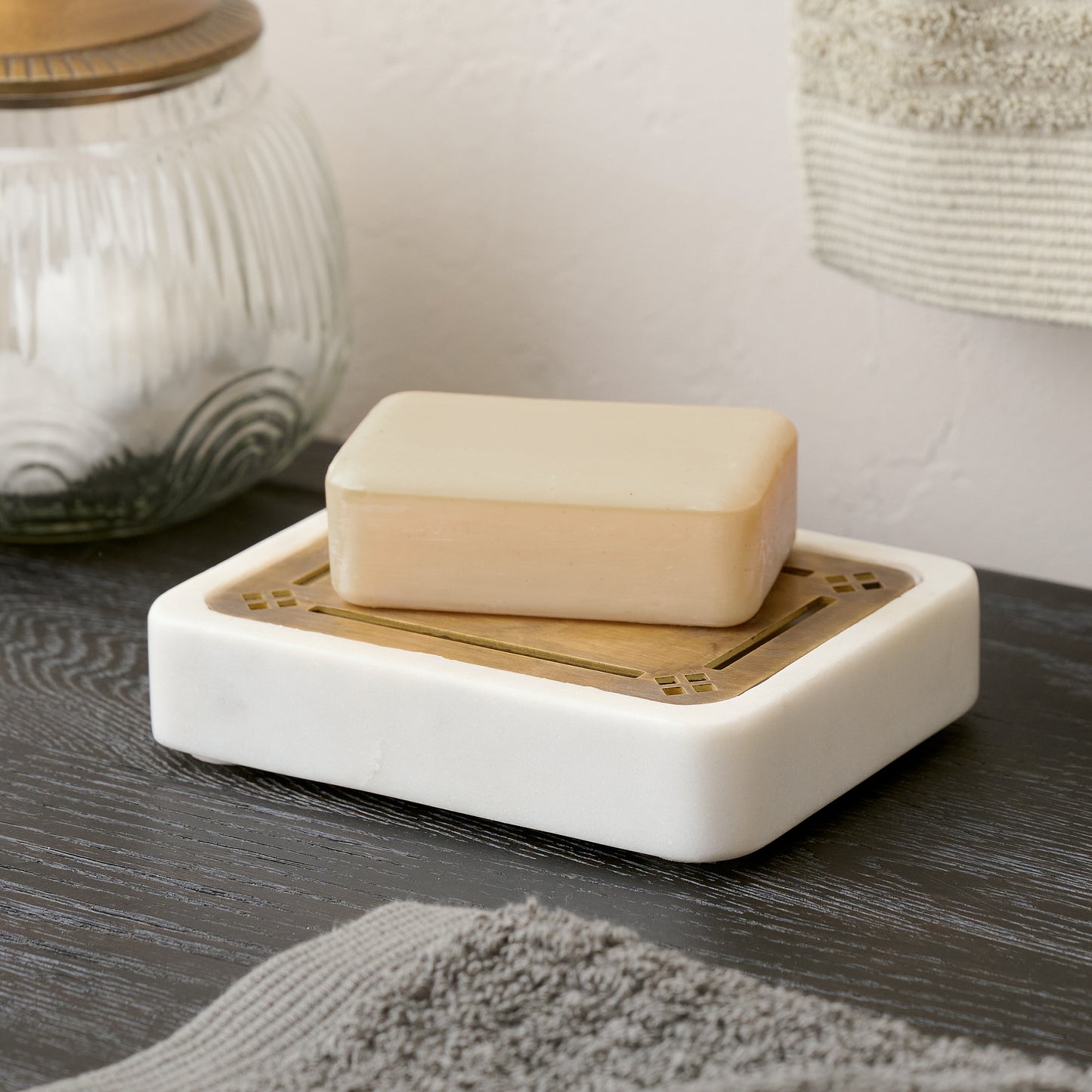 Quincey Marble and Brass Inlay Soap Dish in white shown with bar of soap