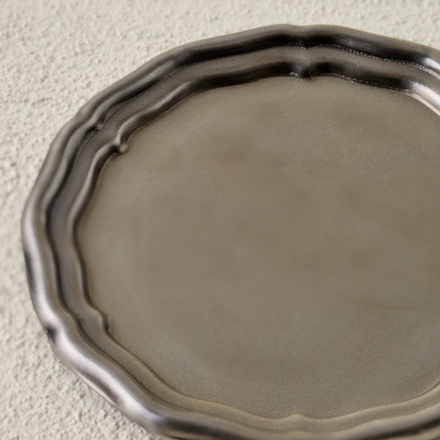 Vintage-Inspired Pewter Coaster Set up close