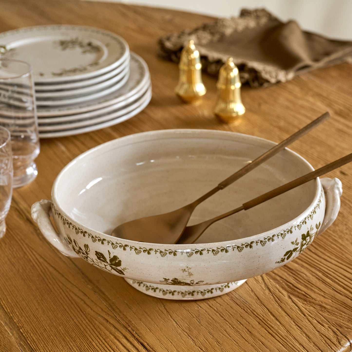 Heirloom Garden Floral Serving Bowl shown on table with serveware