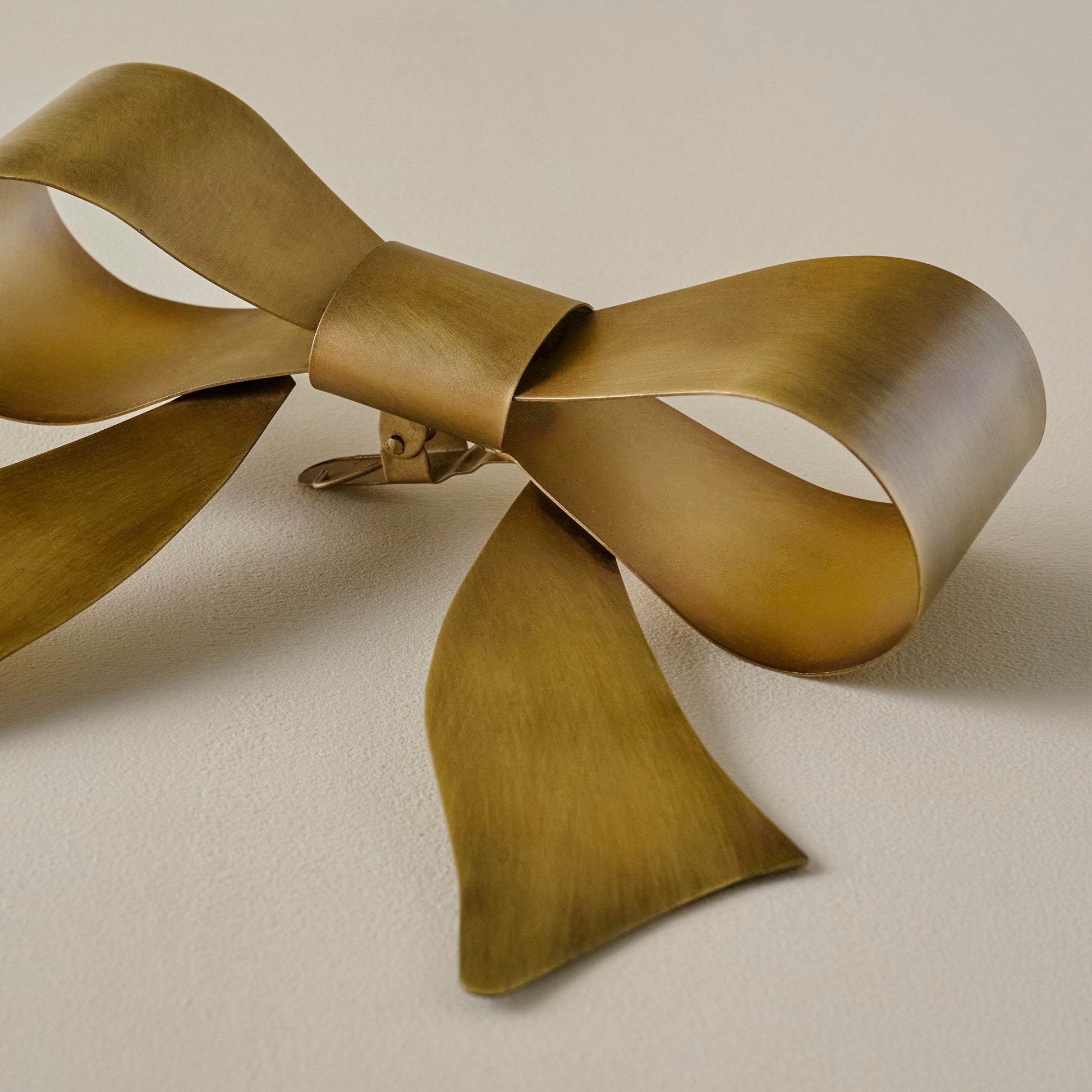 Clara Brass Bow Tree Topper