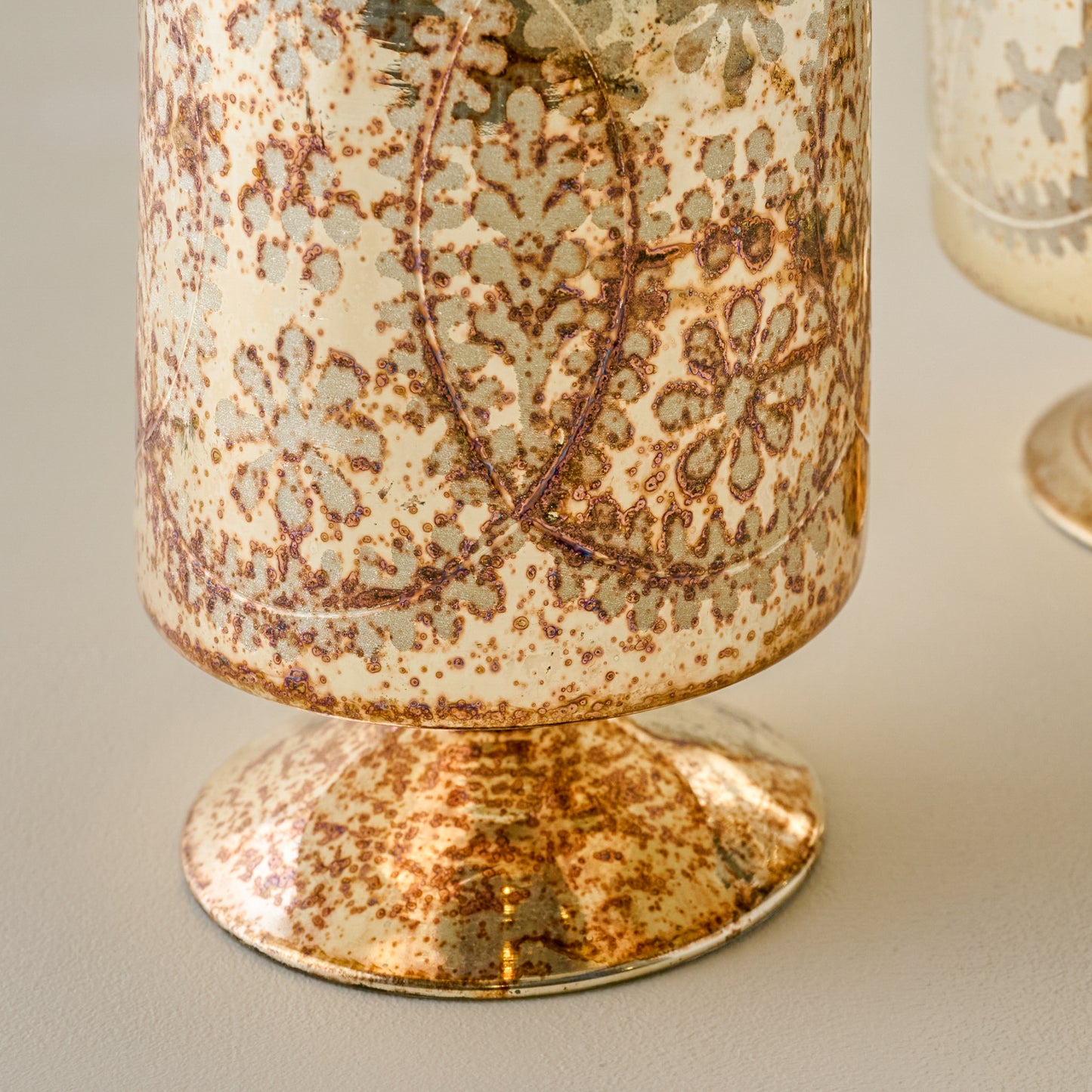 Burnished Mercury Glass Floral Hurricane base up close