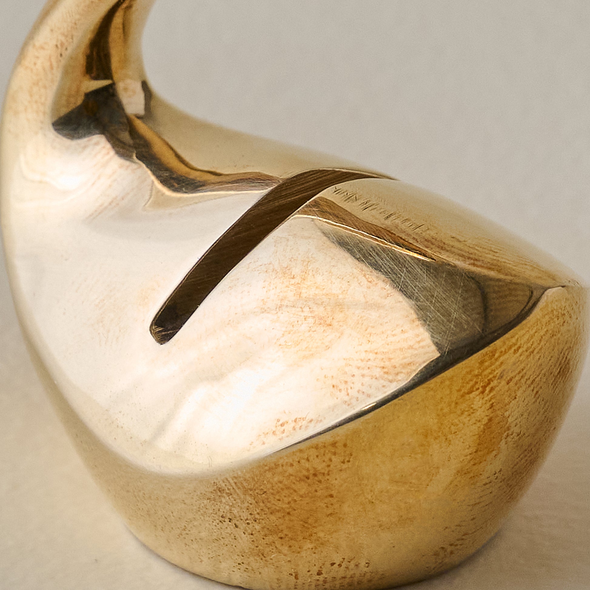 Vintage-Inspired Brass Swan Card Holder up close