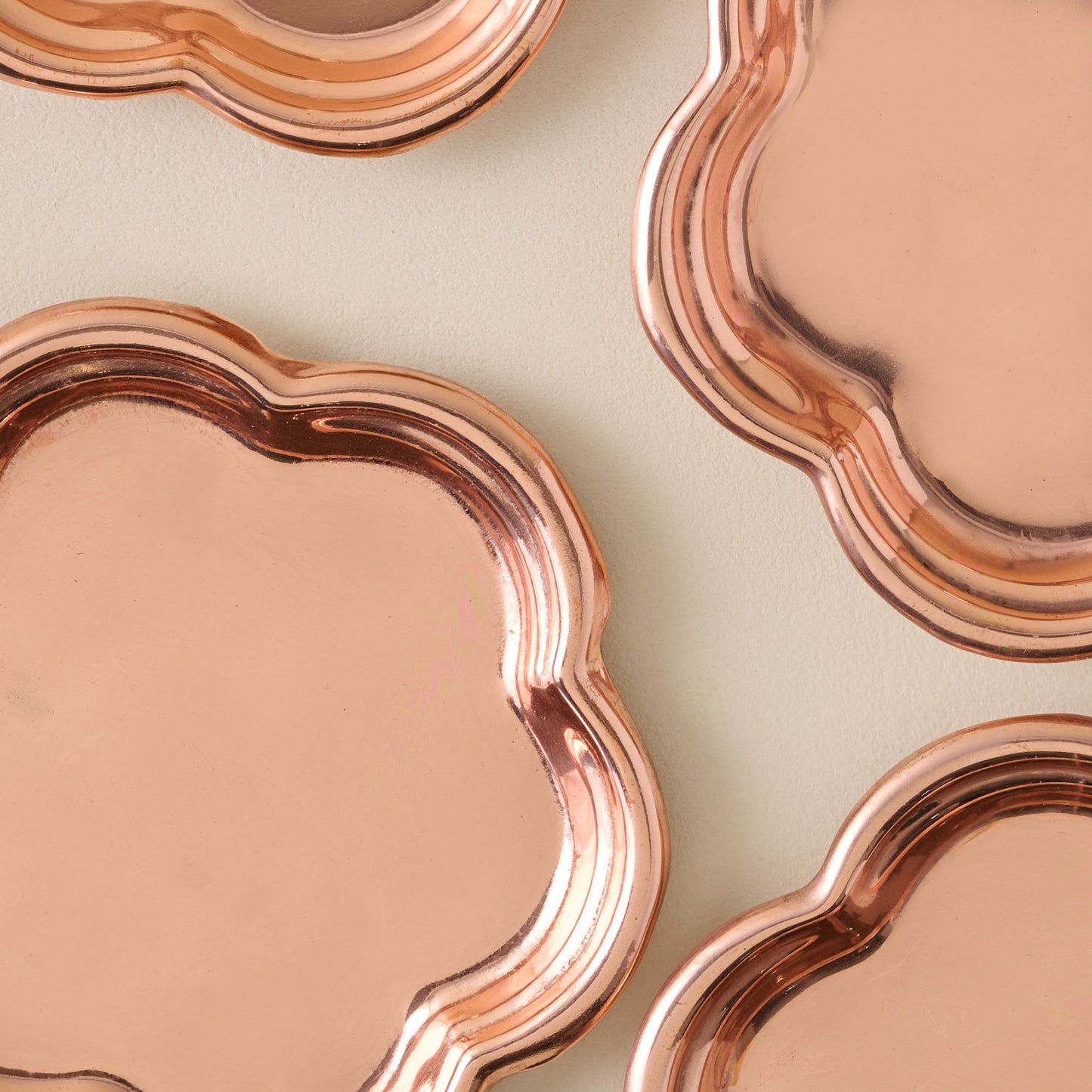 Antique Copper Scalloped Coaster Set of Four up close
