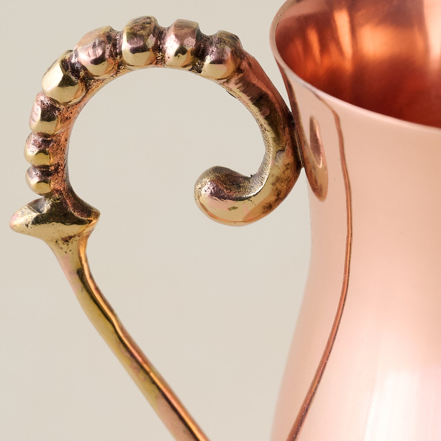 Antique Copper Creamer handle up close