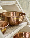 Magnolia Copper Mixing Bowl Set close up on stairs