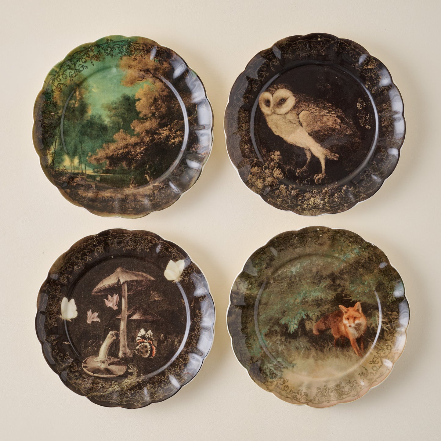 Enchanted Forest Owl Dessert Plate shown with other enchanted forest plates