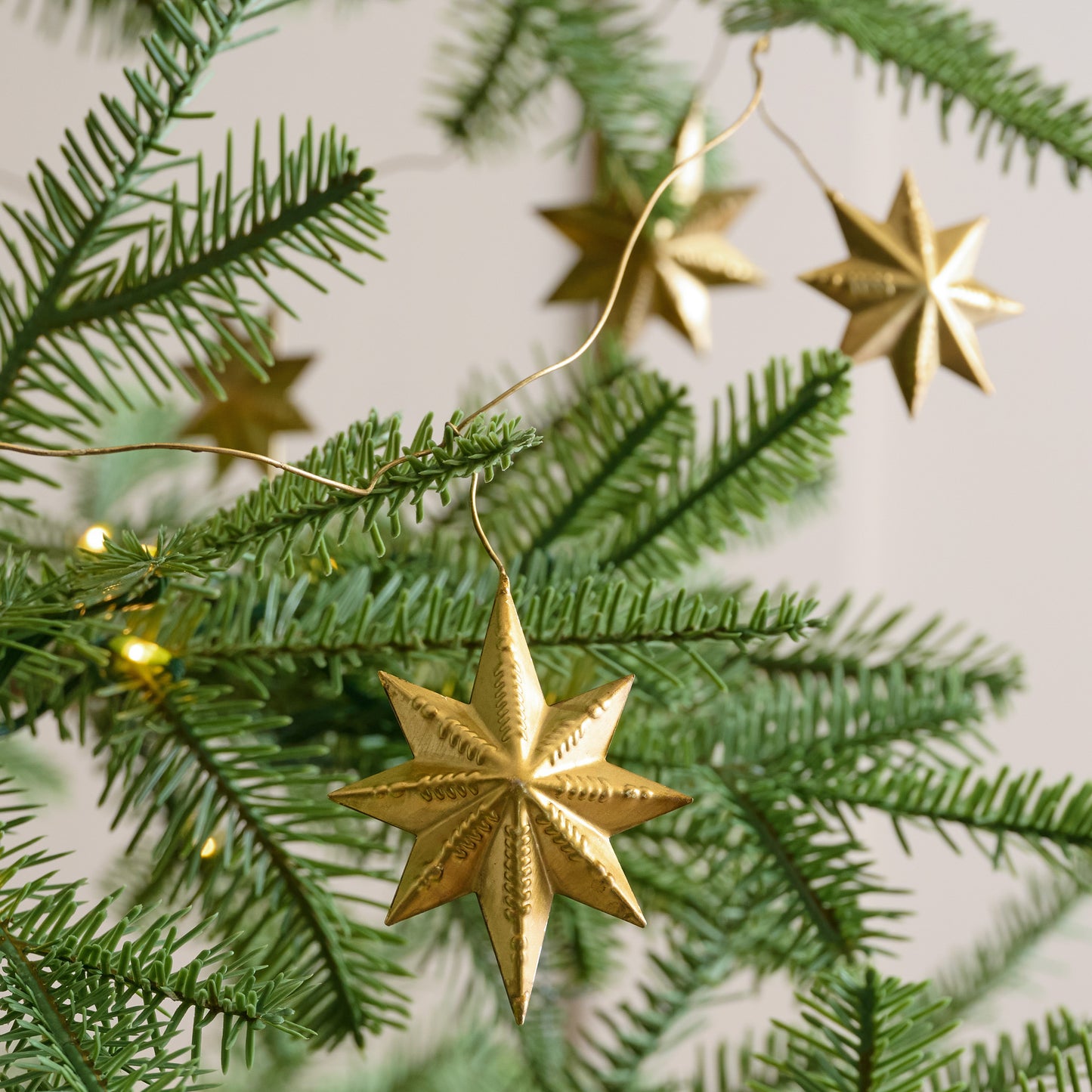 Celestial Star Garland shown on tree up close