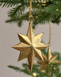Celestial Star Ornaments, Set of 12 shown hung on tree