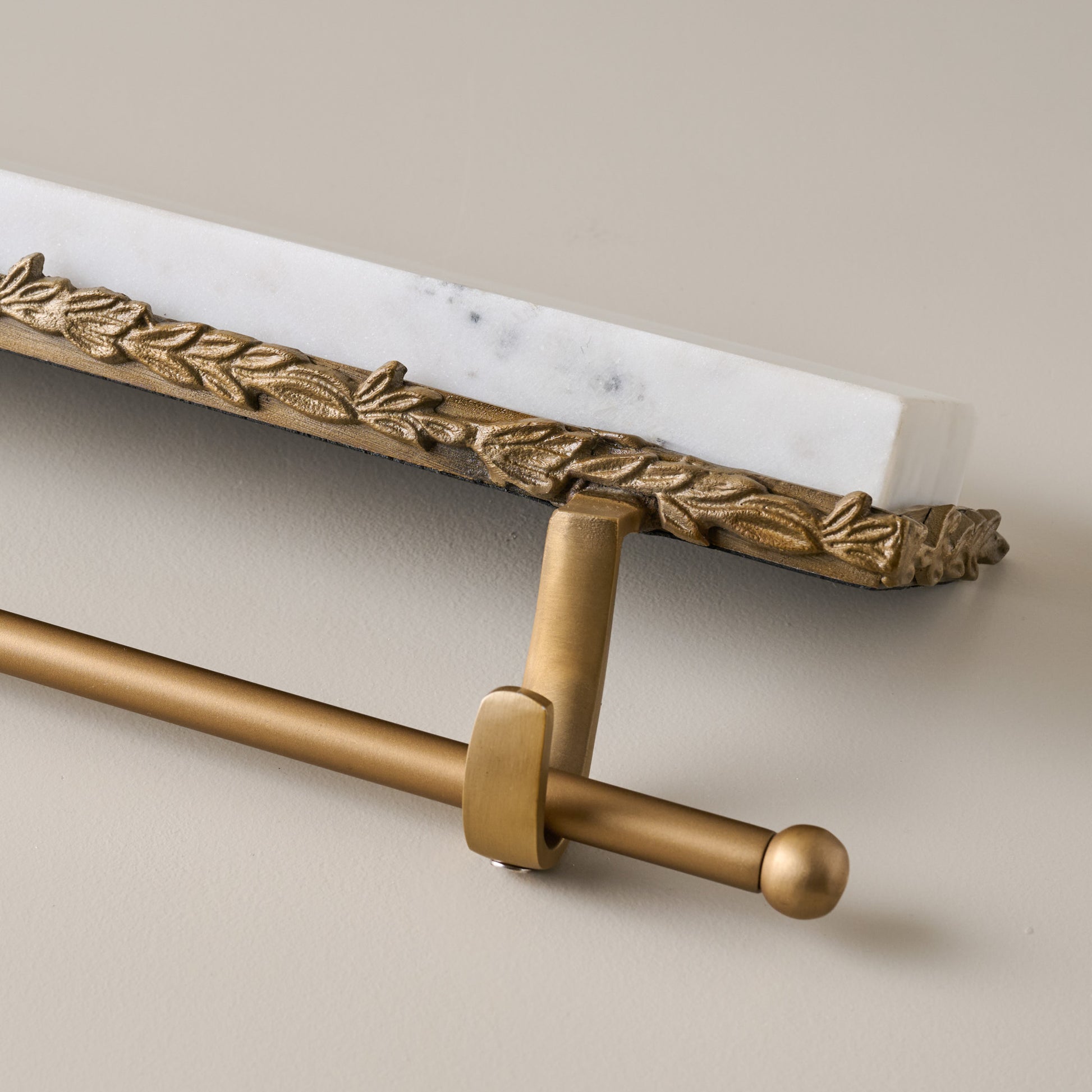 Marble and Gilded Multi Stocking Holder up close