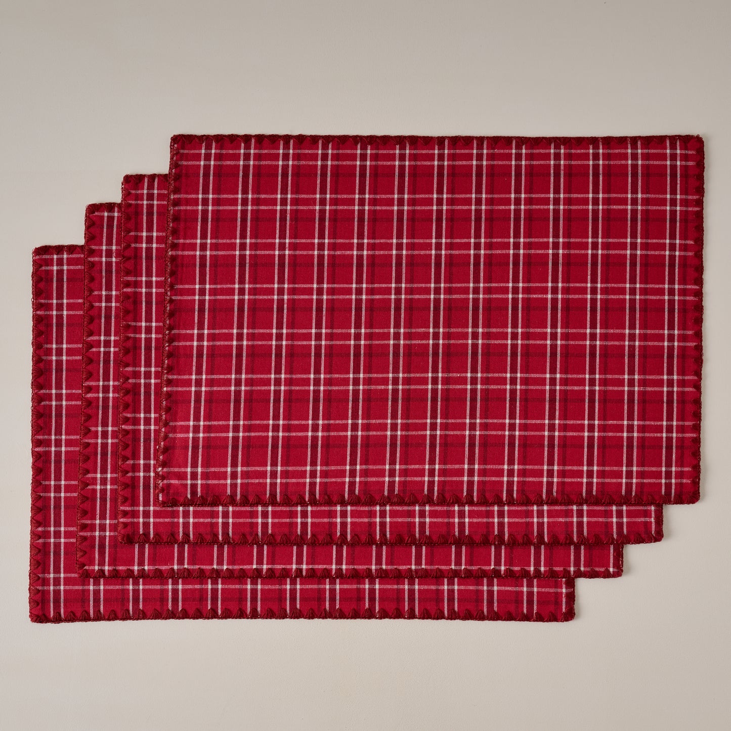 Magnolia Festive Plaid Reversible Placemat Set of Four - red side showing