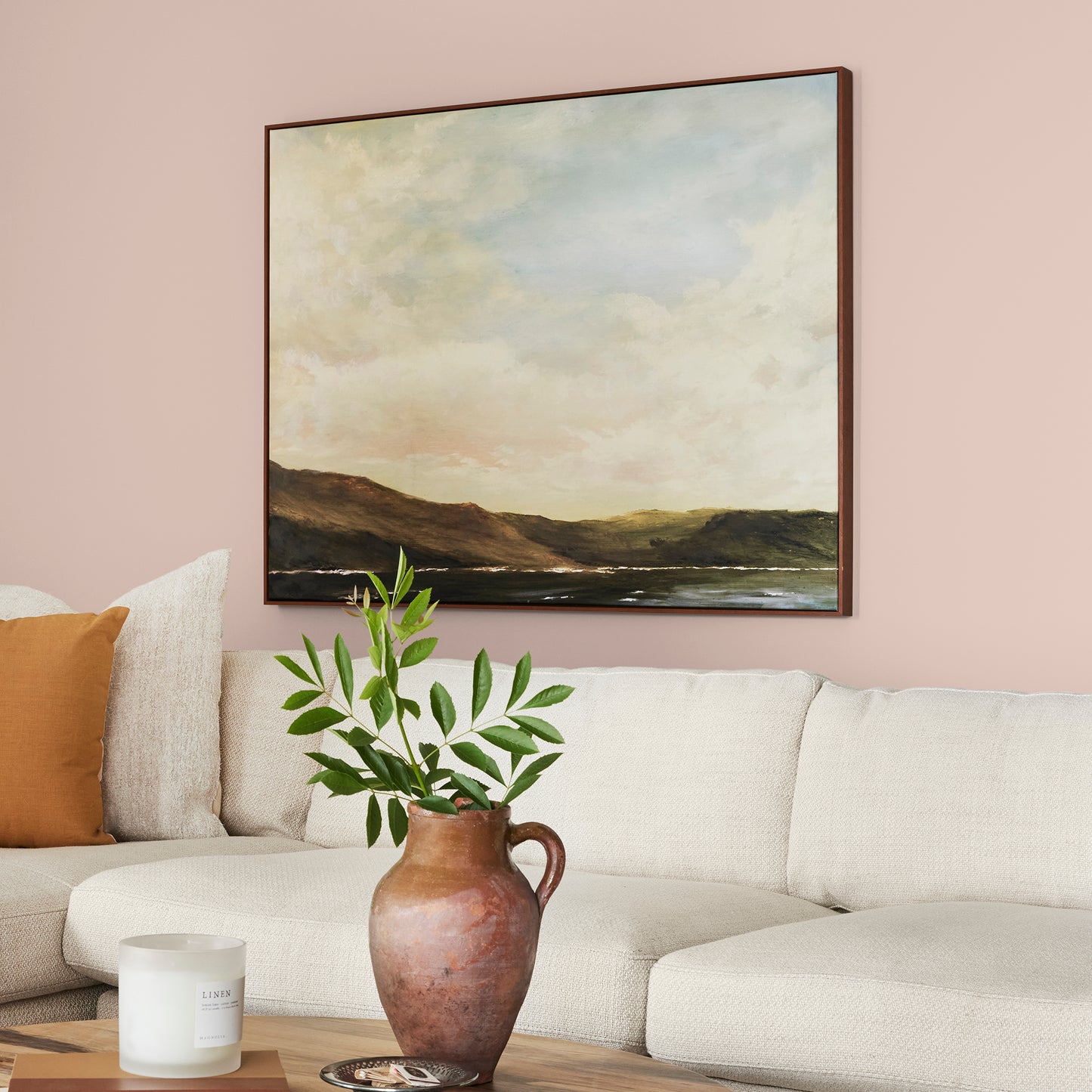muted light pink paint named ella rose painted on living room wall