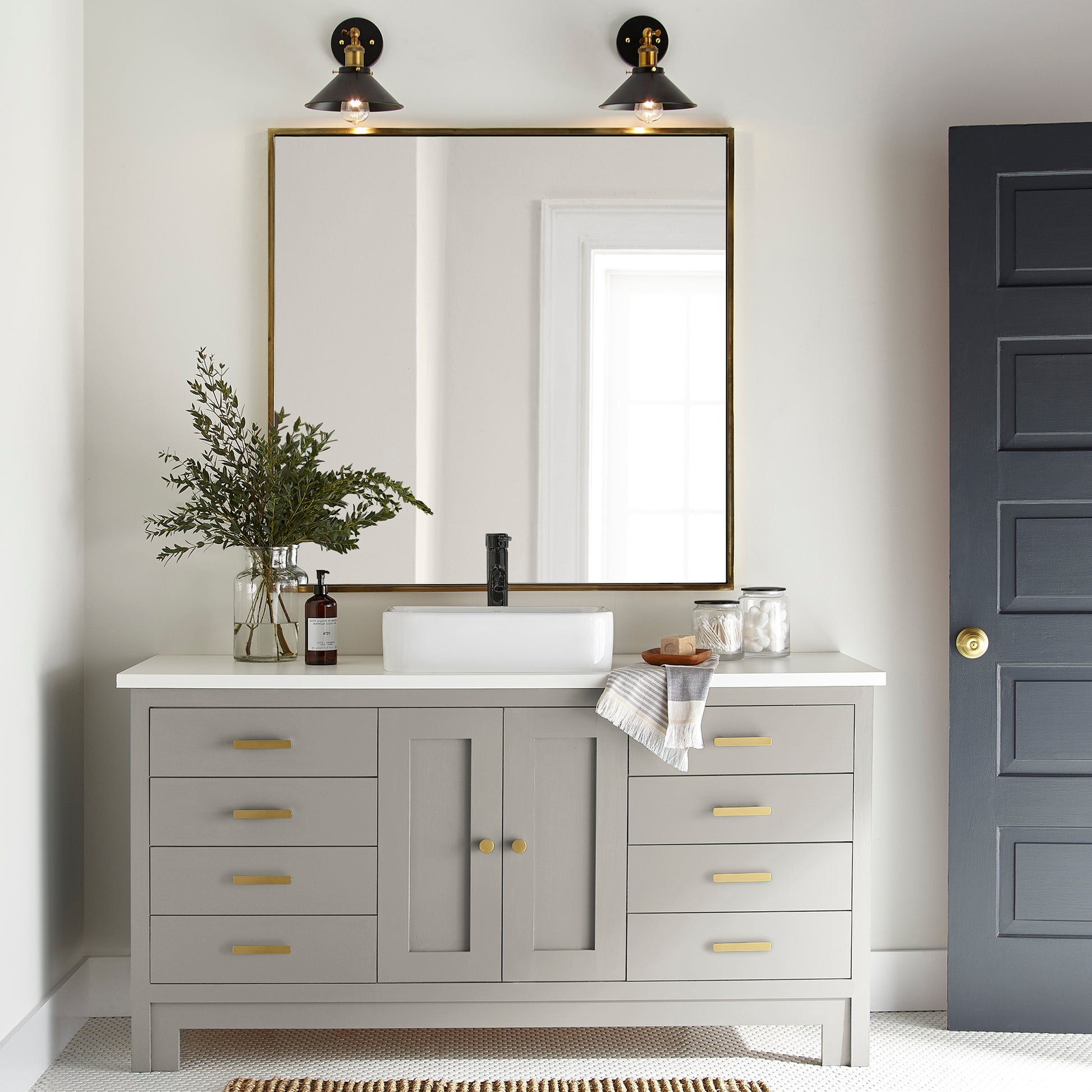 medium warm grey paint named sunday stroll shown painted on bathroom cabinet