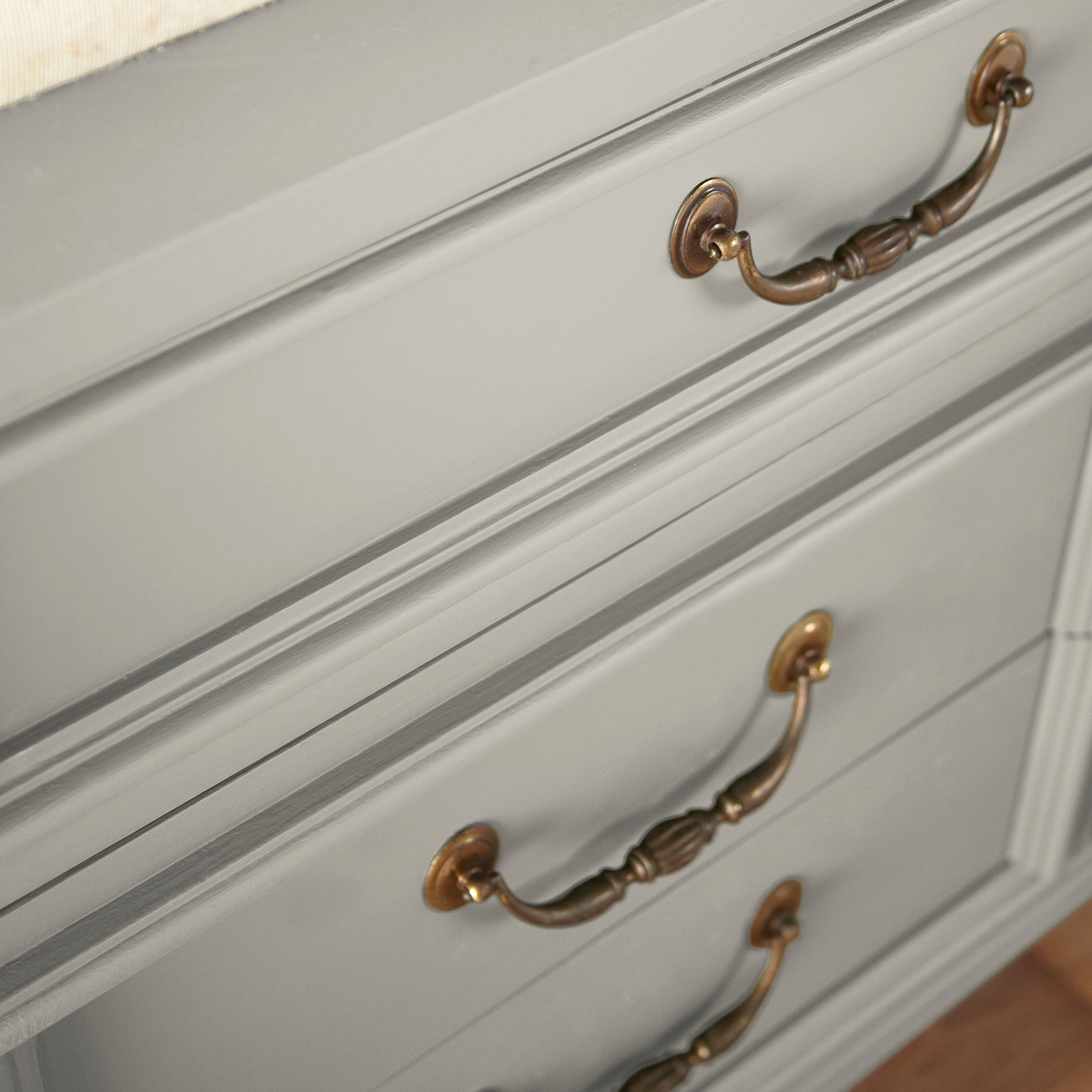 medium warm grey paint named sunday stroll shown painted on cabinet
