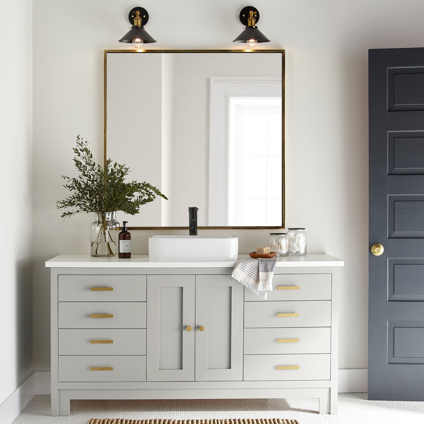 creamy off-white paint named shiplap shown painted on bathroom cabinet