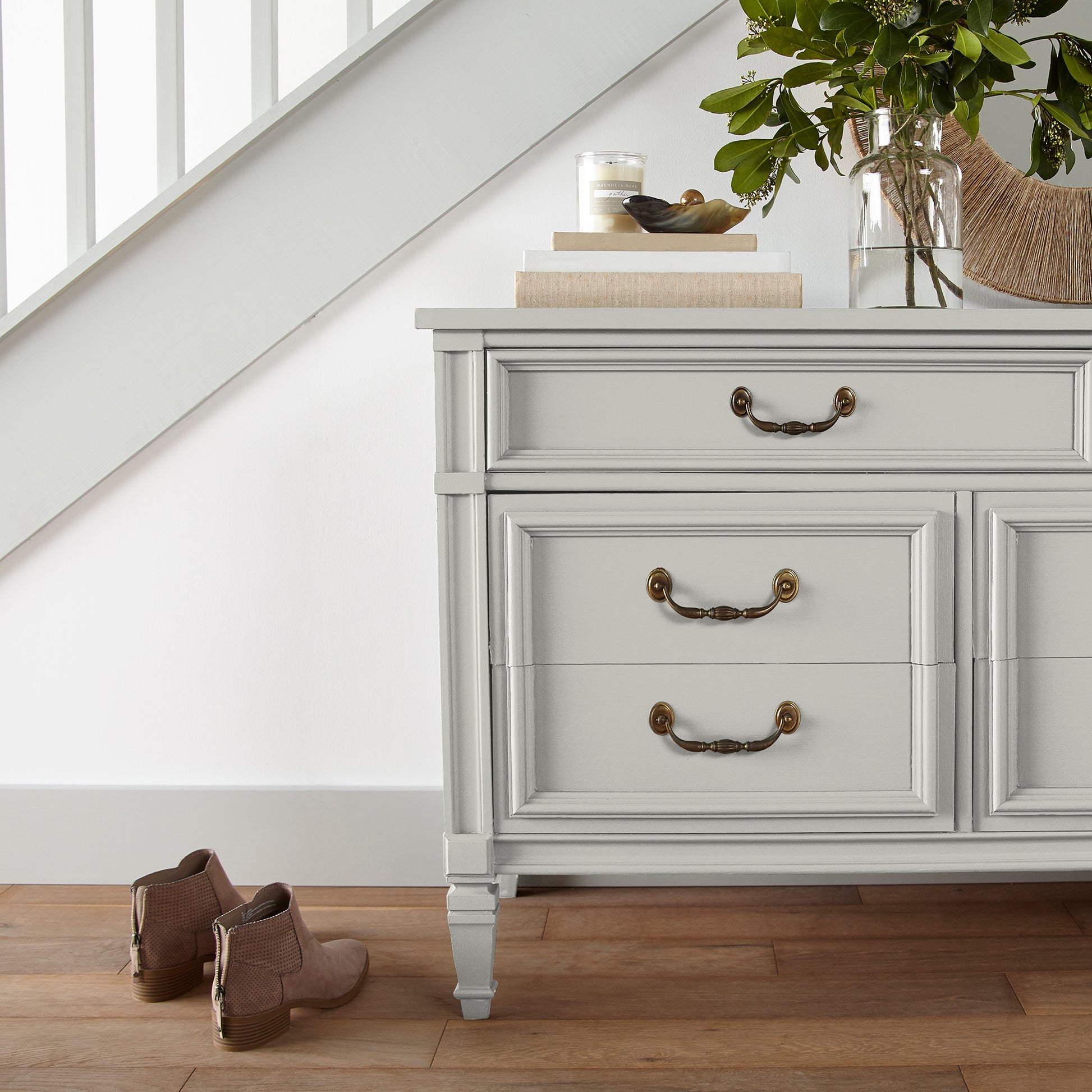 creamy off-white paint  named shiplap shown painted on entryway cabinet