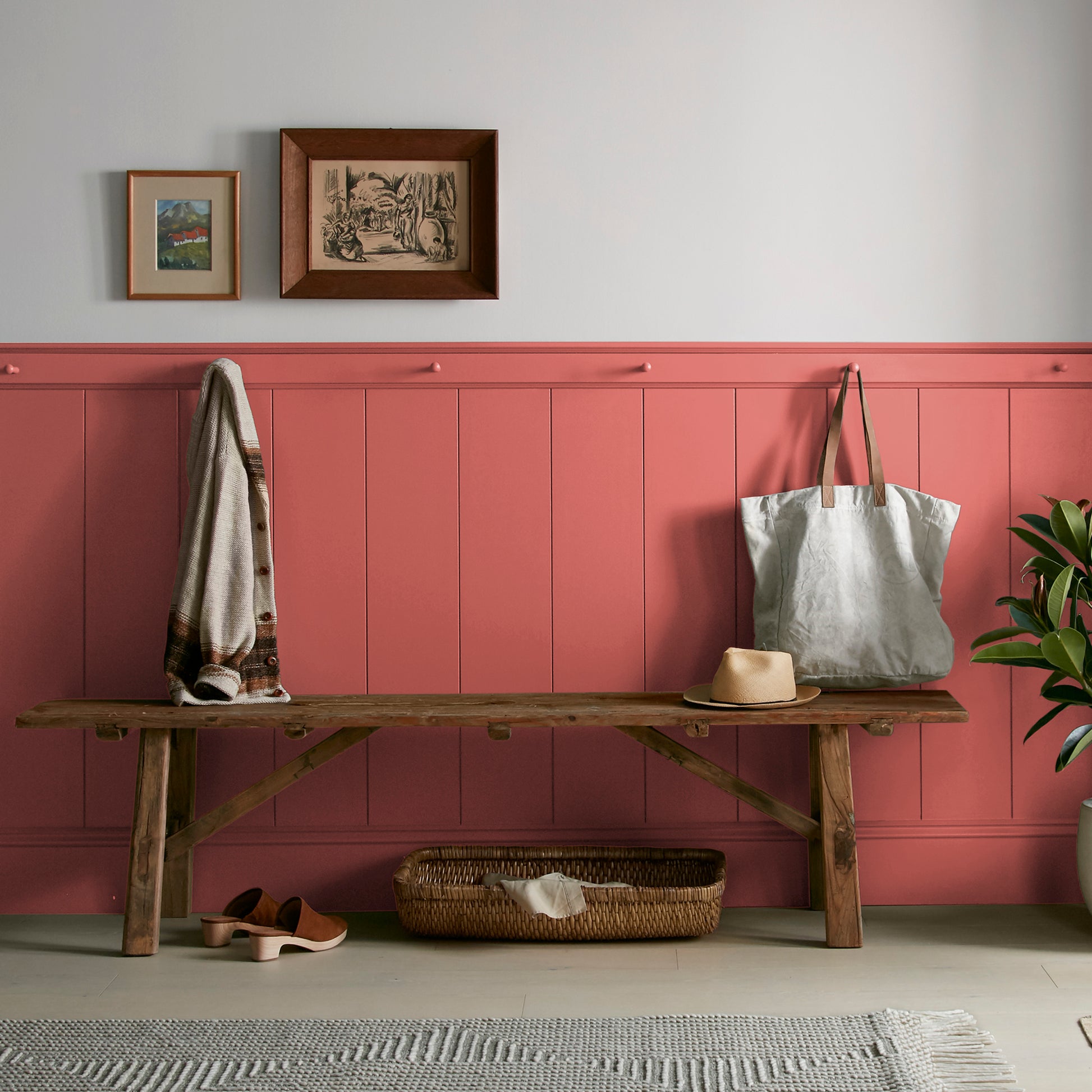 vibrant red with orange undertones interior paint named ripened tomato shown painted on entryway wall