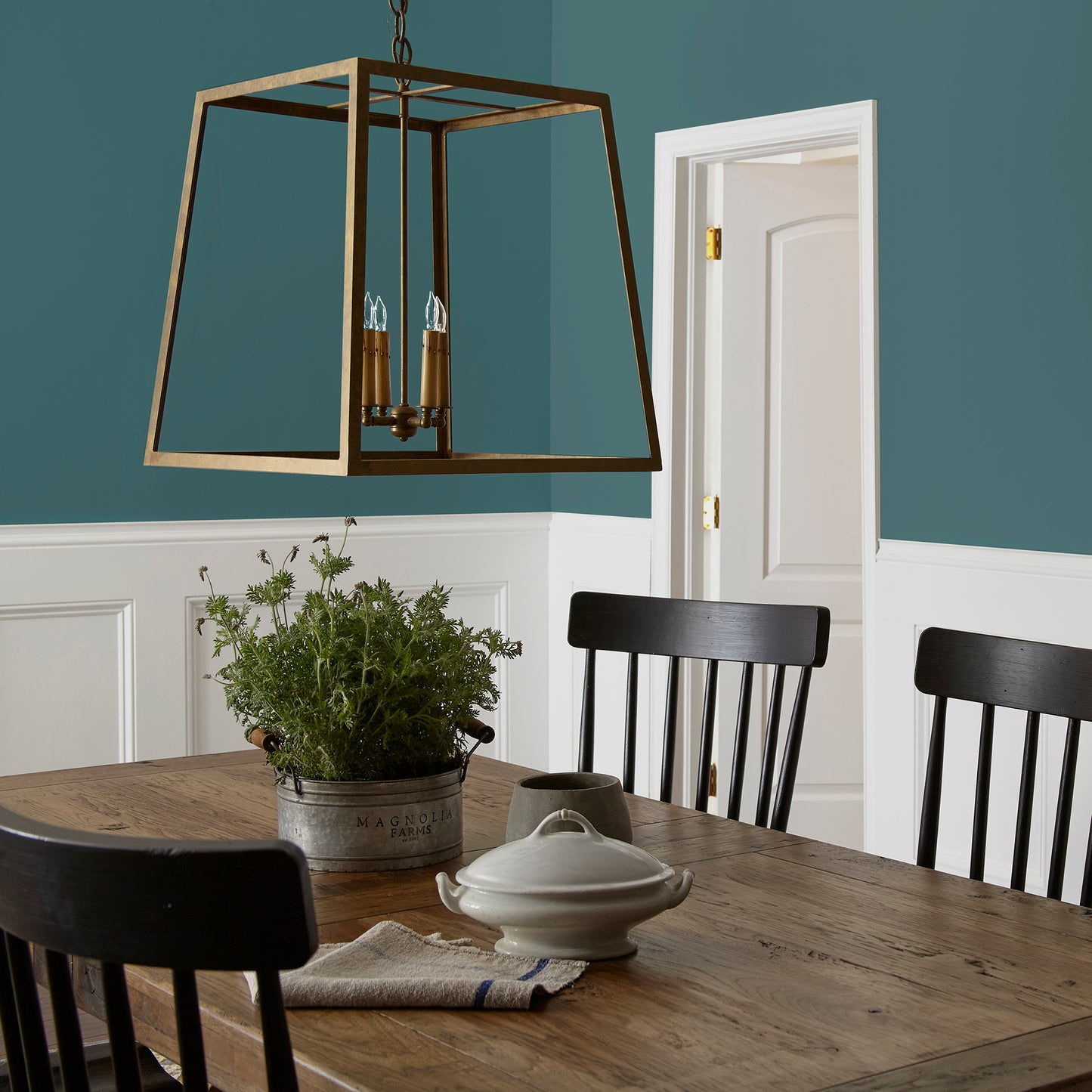 dark denim blue interior paint named weekend shown painted on dining room wall