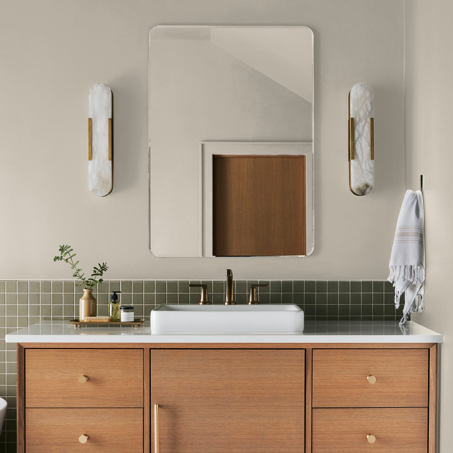 warm honey yellow interior paint named carter creme shown painted on bathroom wall