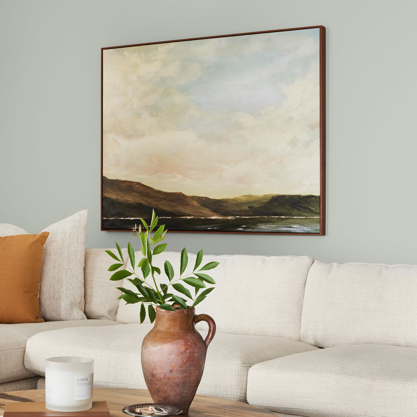light blue grey with light green undertone interior paint named emmies room shown painted on living room wall