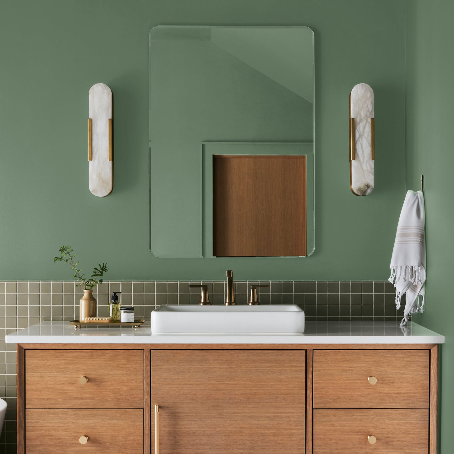 evergreen green paint named magnolia green shown painted on bathroom wall