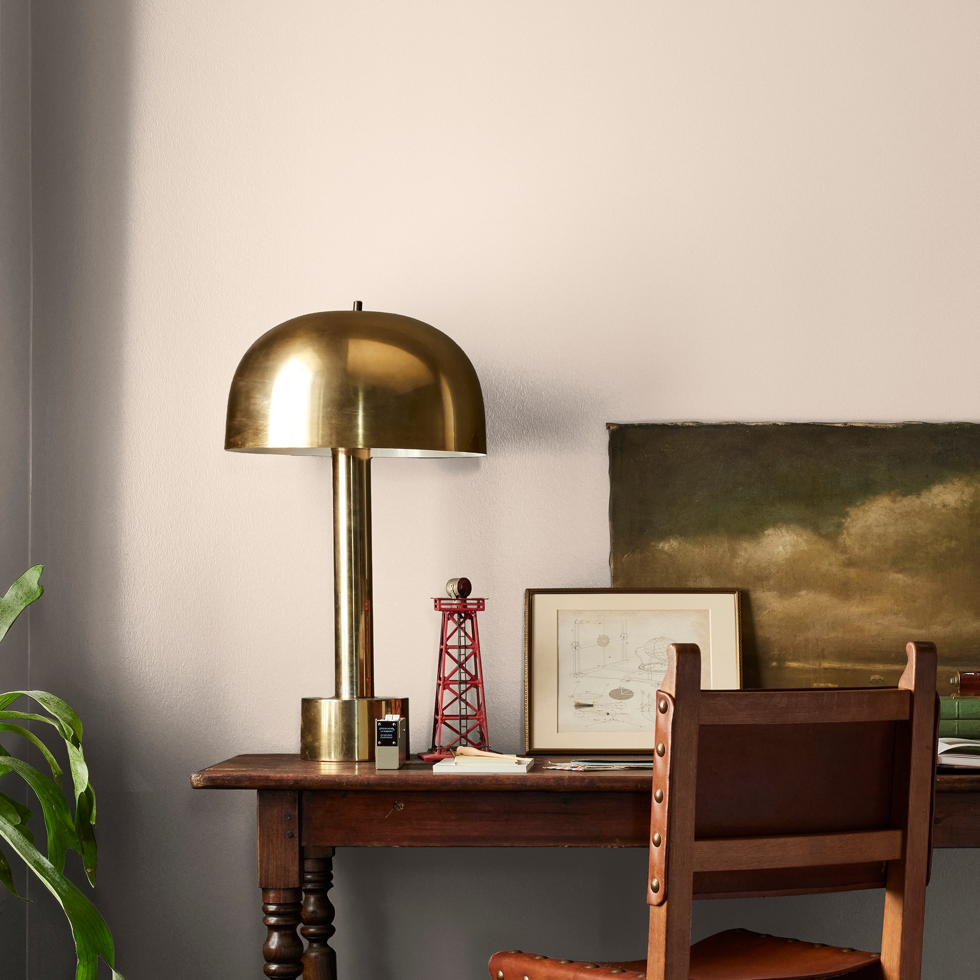 Warm soft peach interior paint named dutch tulip shown painted on bedroom wall