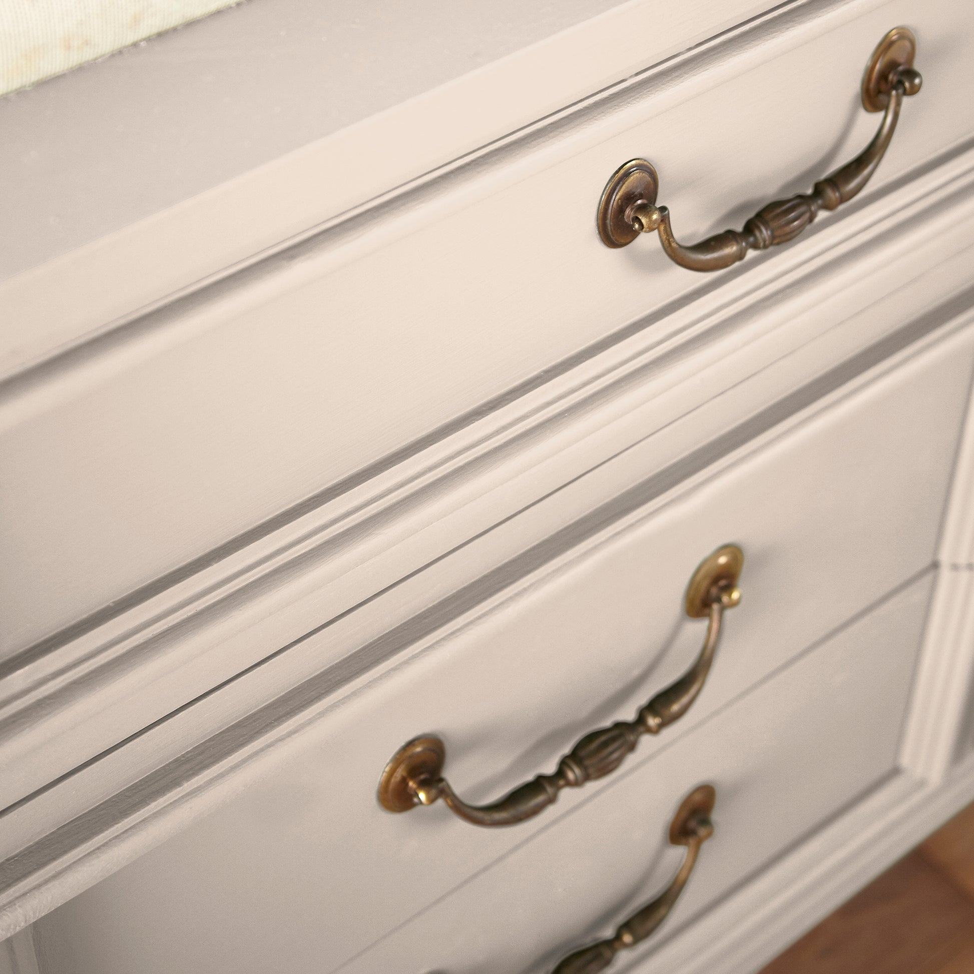 Warm soft peach trim, door and cabinetry paint named dutch tulip shown painted on cabinet