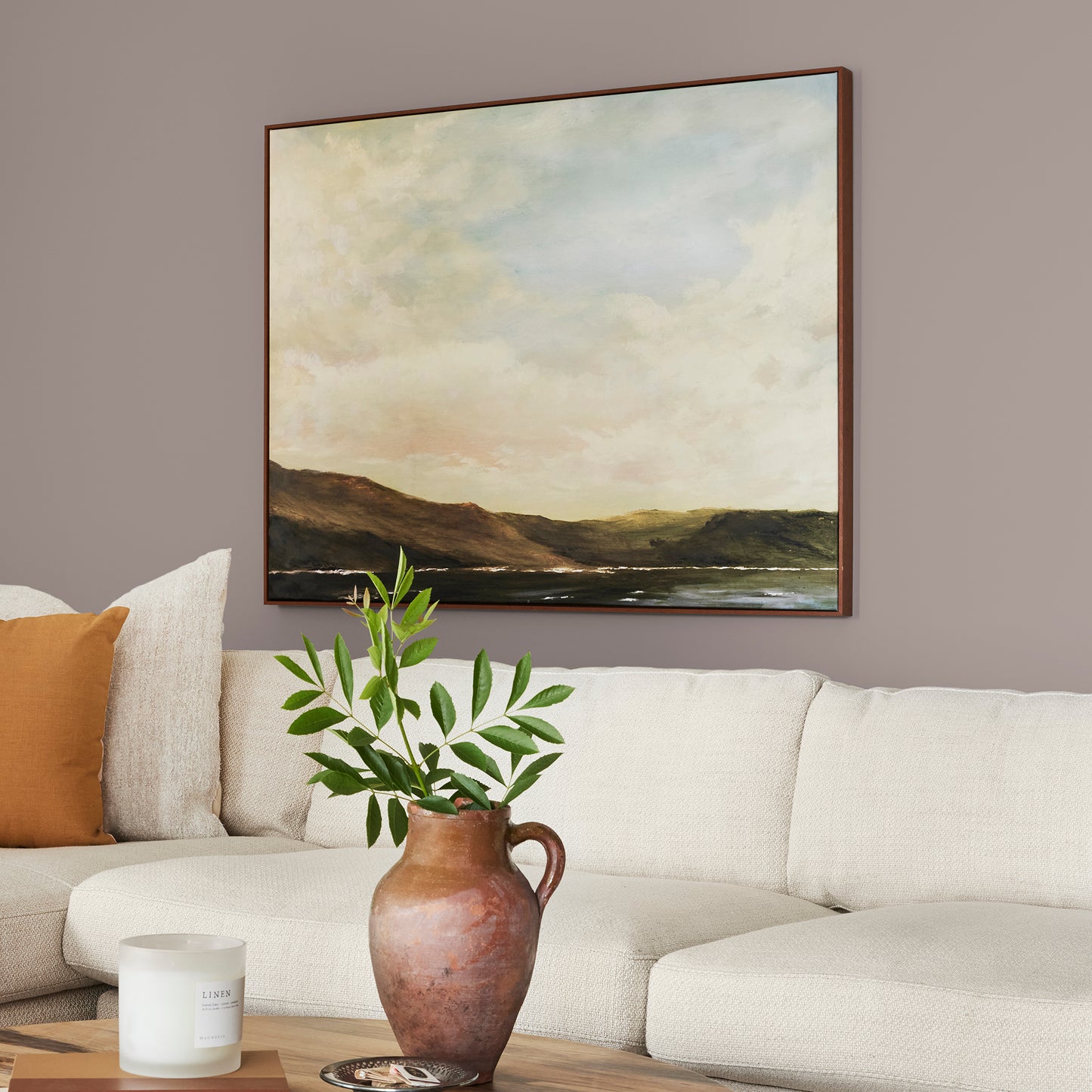 A mid-tone mauve interior paint named homebody shown painted on living room wall