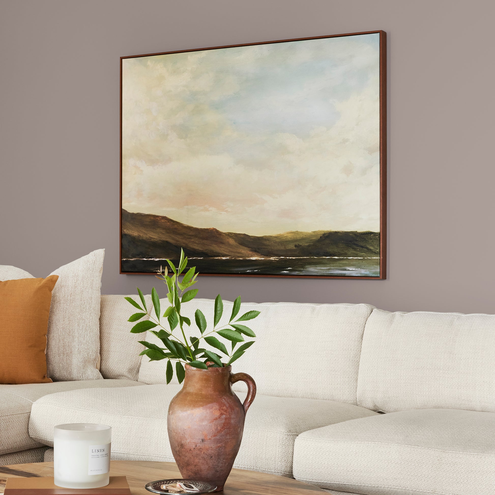 A mid-tone mauve interior paint named homebody shown painted on living room wall
