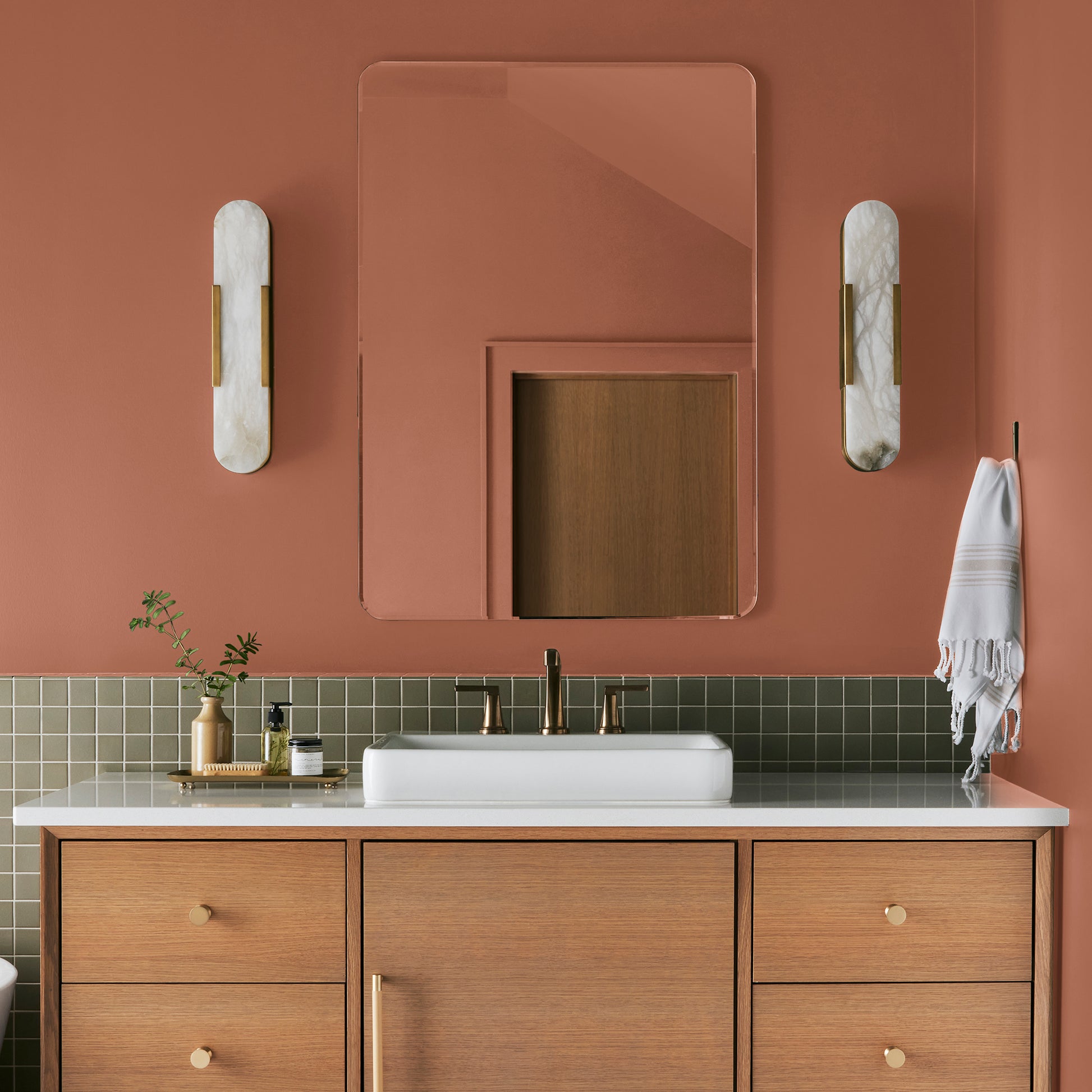 burnt orange paint named work worn wood shown painted on bathroom wall