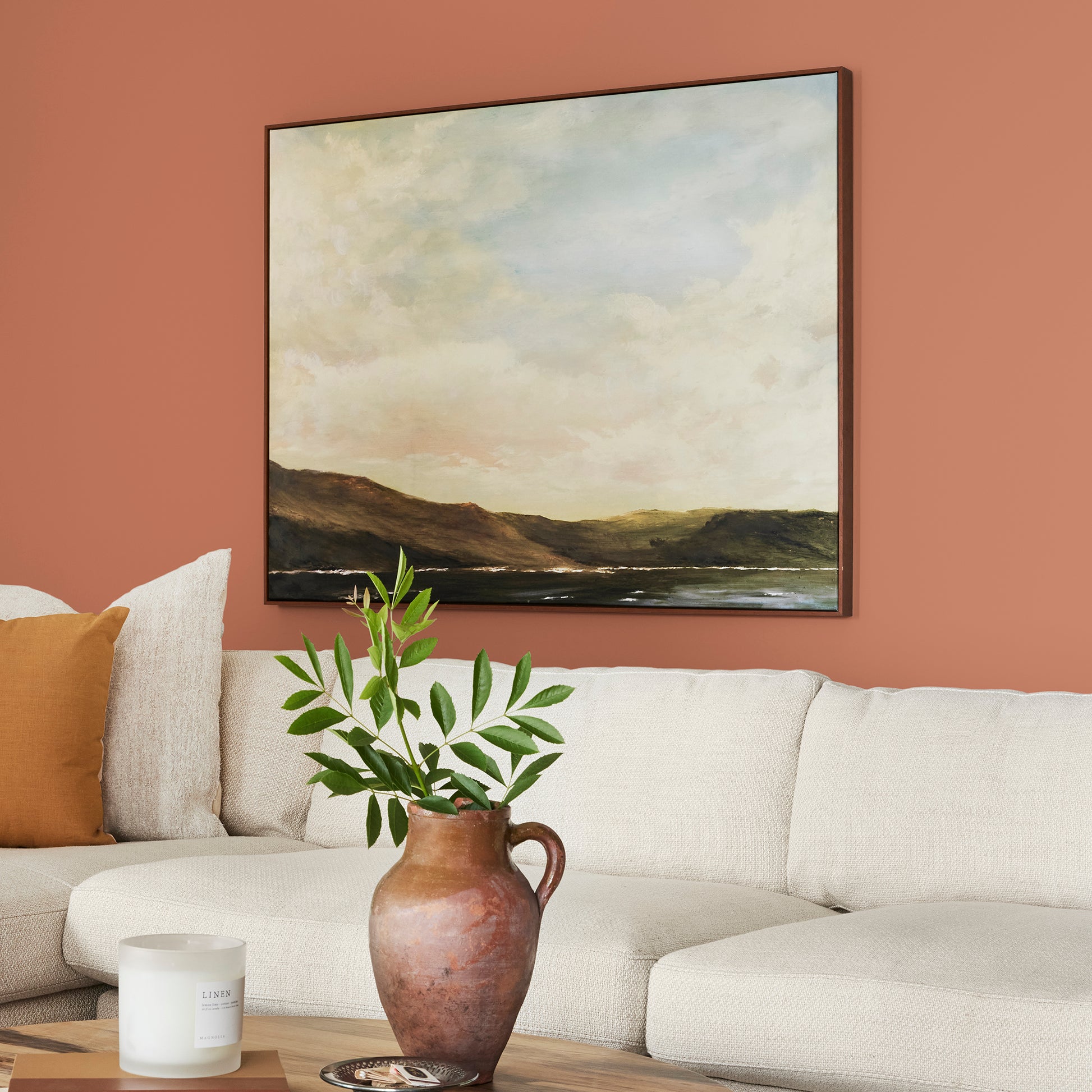 burnt orange paint named work worn wood shown painted on living room wall