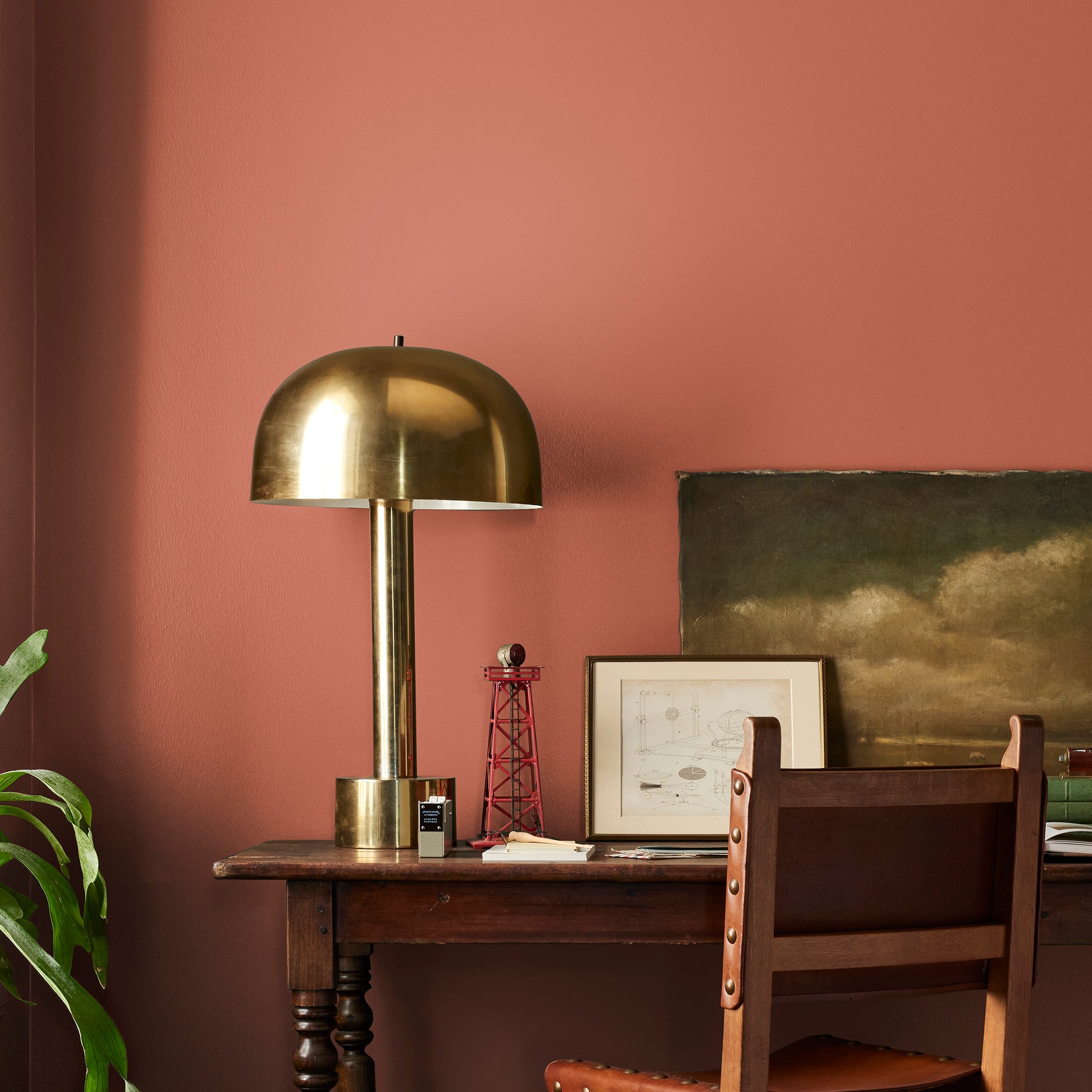 Deep Terra Cotta interior paint named on bosque shown painted on bedroom wall